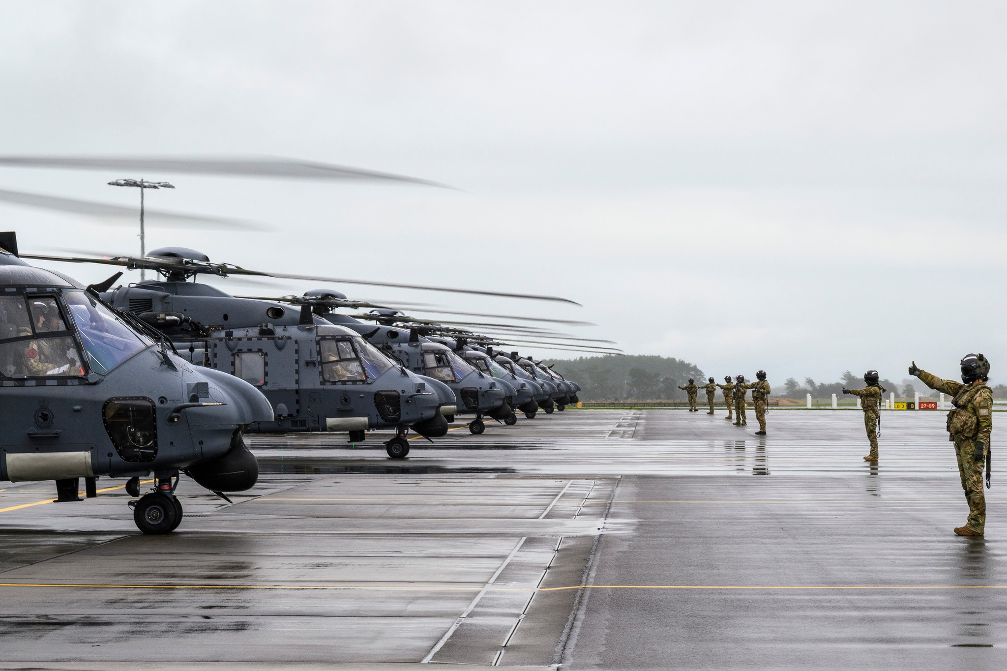 A formation of 7 NH90s flies over the Manawatu region as 3 Squadron demonstrates their maintenance and aircrew capability