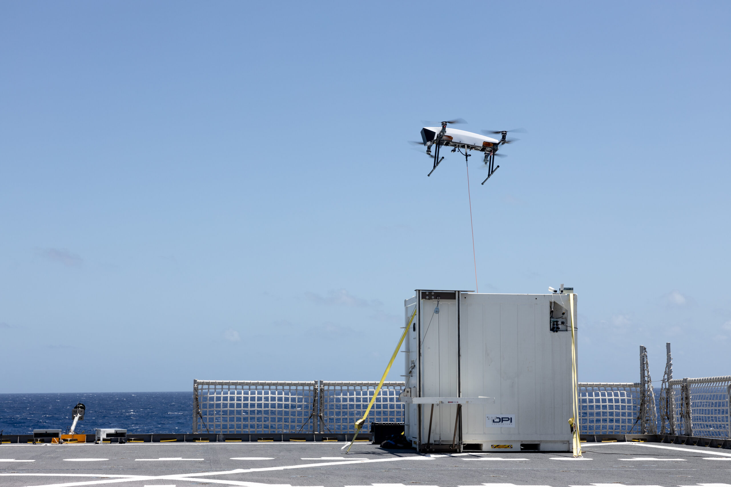 220425-M-JX780-1062 ATLANTIC OCEAN (April 25, 2022) – A tethered drone takes off from the expeditionary fast transport vessel USNS Burlington (T-EPF-10) during a fleet experimentation period with scientists working with the Office of Naval Research and U.S. Naval Forces Southern Command/U.S. 4th Fleet. The fleet experimentation serves to demonstrate Navy/Marine Corps integration by testing concepts that would be employed during expeditionary advance base operations, evaluating expeditionary systems for force protection and coordinated electronic warfare. (U.S. Marine Corps photo by Cpl. Brendan Mullin)
