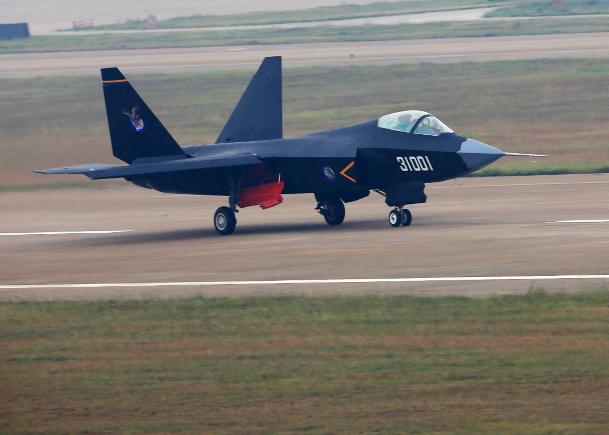 --FILE--A Chinese J-31 stealth fighter jet taxis before taking off for a demonstration flight during the 10th China International Aviation and Aerospace Exhibition, also known as Airshow China 2014, in Zhuhai city, south China's Guangdong province, 11 November 2014. China has tested the latest version of its fifth-generation stealth fighter, state media reported on Monday (26 December 2016), as it tries to end the West's monopoly on the world's most advanced warplanes. The test comes as the nation flexes its military muscles, sending its sole aircraft carrier the Liaoning into the western Pacific in recent days to lead drills there for the first time. The newest version of the J-31, now renamed the FC-31 Gyrfalcon, took to the air for the first time on Friday, the China Daily reported. The so-called 