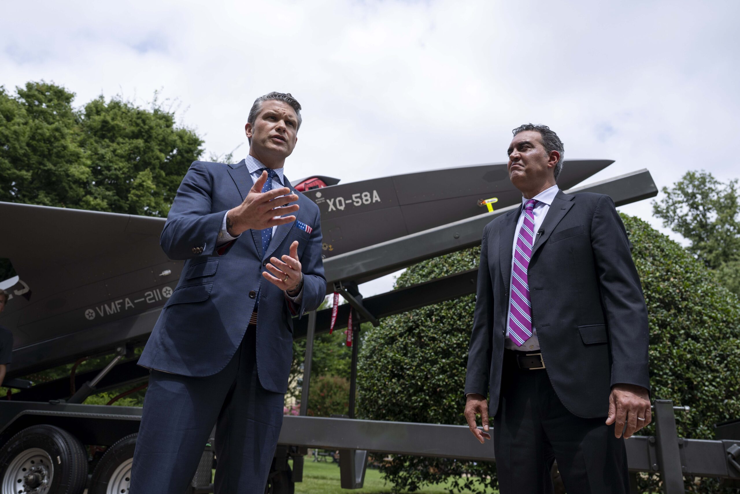 US Defense Secretary Pete Hegseth and Undersecretary of Defense for Research and Engineering Emil Michael deliver remarks to the press while touring multi-domain autonomous displays at the Pentagon, July 16, 2025.