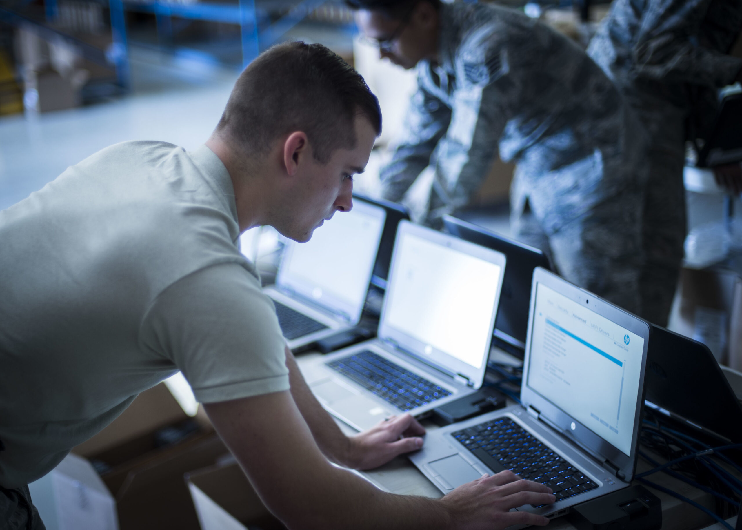 Cyber operator installs software to a laptop