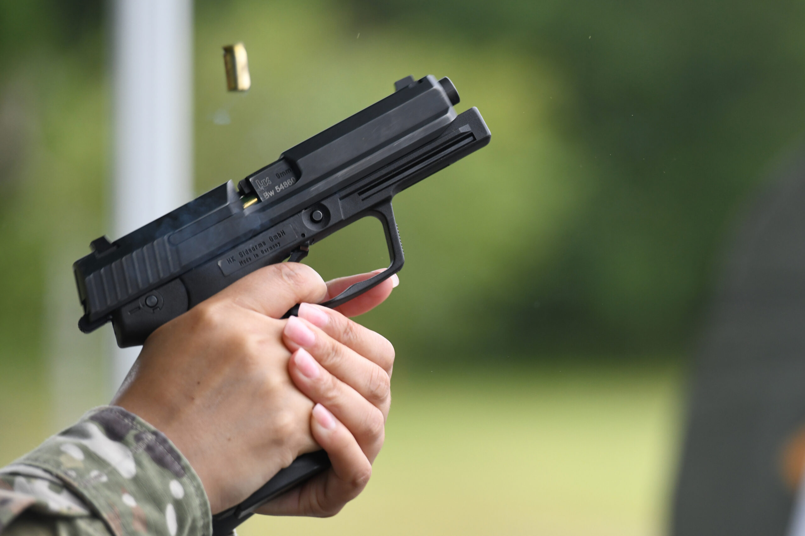 A U.S. Soldier fires a H&K P8 pistol during a qualification for the “Schuetzenschnur”, the German Armed Forces Badge of Marksmanship, at the 7th Army Training Command’s Grafenwoehr Training Area, Germany, July 7, 2021. (U.S. Army photo by Gertrud Zach)
