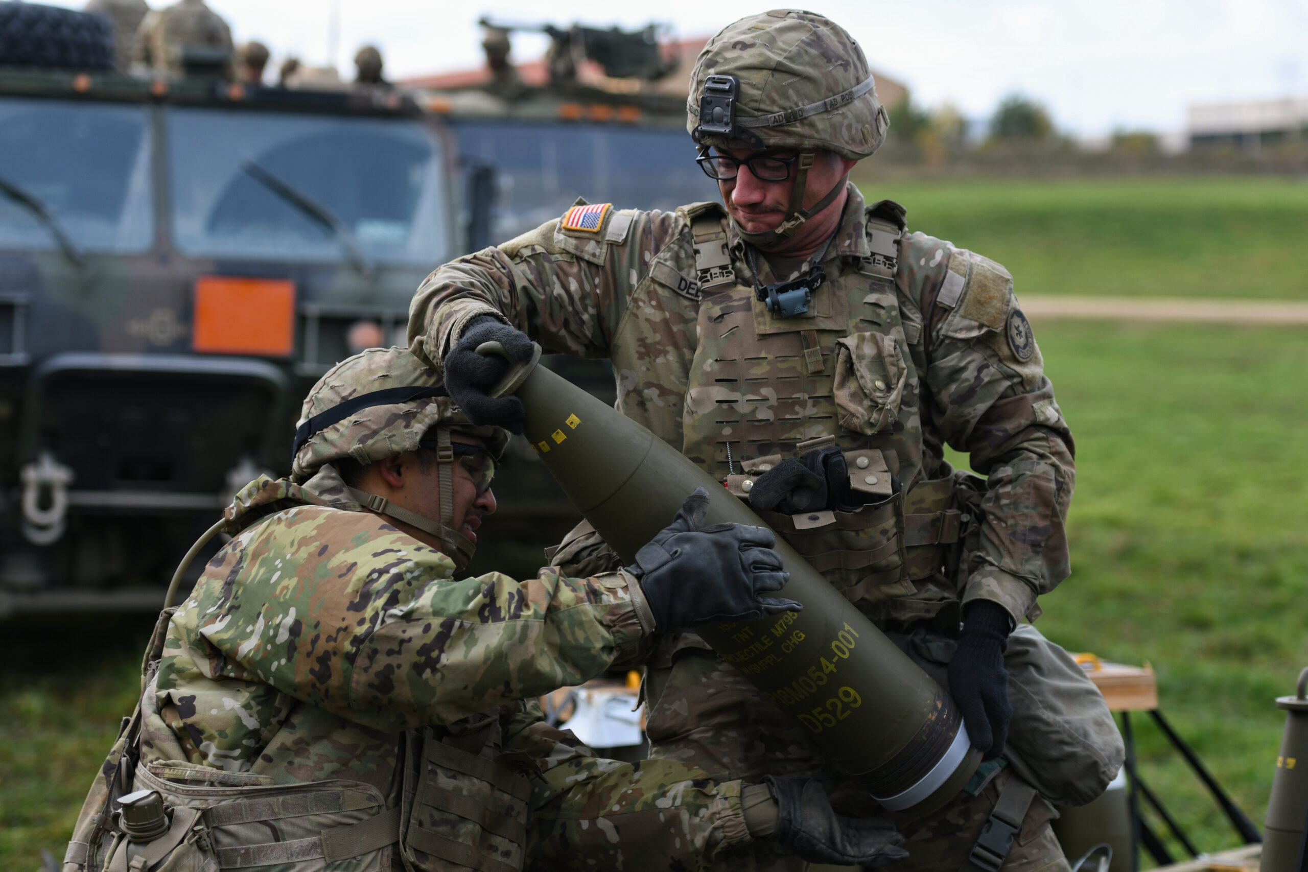 U.S. Soldiers assigned to C Battery, Field Artillery Squadron, 2nd Cavalry Regiment, prepare 155mm ammunition during a Table XV Battery Certification live fire exercise, Nov. 7, 2022 at the 7th Army Training Command's Grafenwoehr Training Area, Germany. (U.S. Army photo by Markus Rauchenberger)
