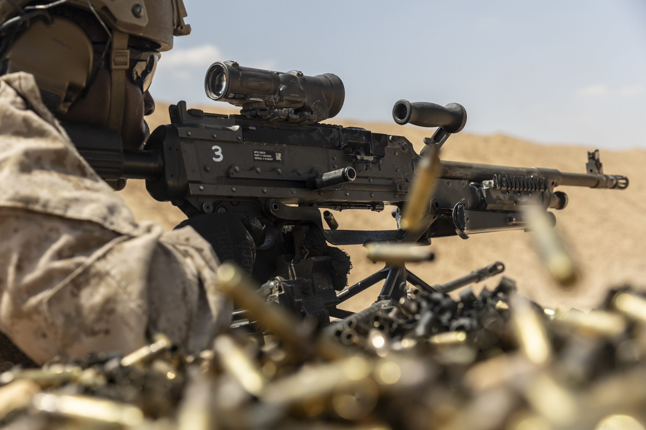 A U.S. Navy Corpsman with Fleet Anti-terrorism Security Team Central Command fires the M240L machine gun during exercise Bright Star 23 at Mohamed Naguib Military Base (MNMB), Egypt, Sept. 5, 2023. Bright Star 23 is a multilateral U.S. Central Command exercise held with the Arab Republic of Egypt across air, land, and sea domains that promotes and enhances regional security and cooperation, and improves interoperability in irregular warfare against hybrid threat scenarios. (U.S. Marine Corps photo by Lance Cpl. Samuel Qin)