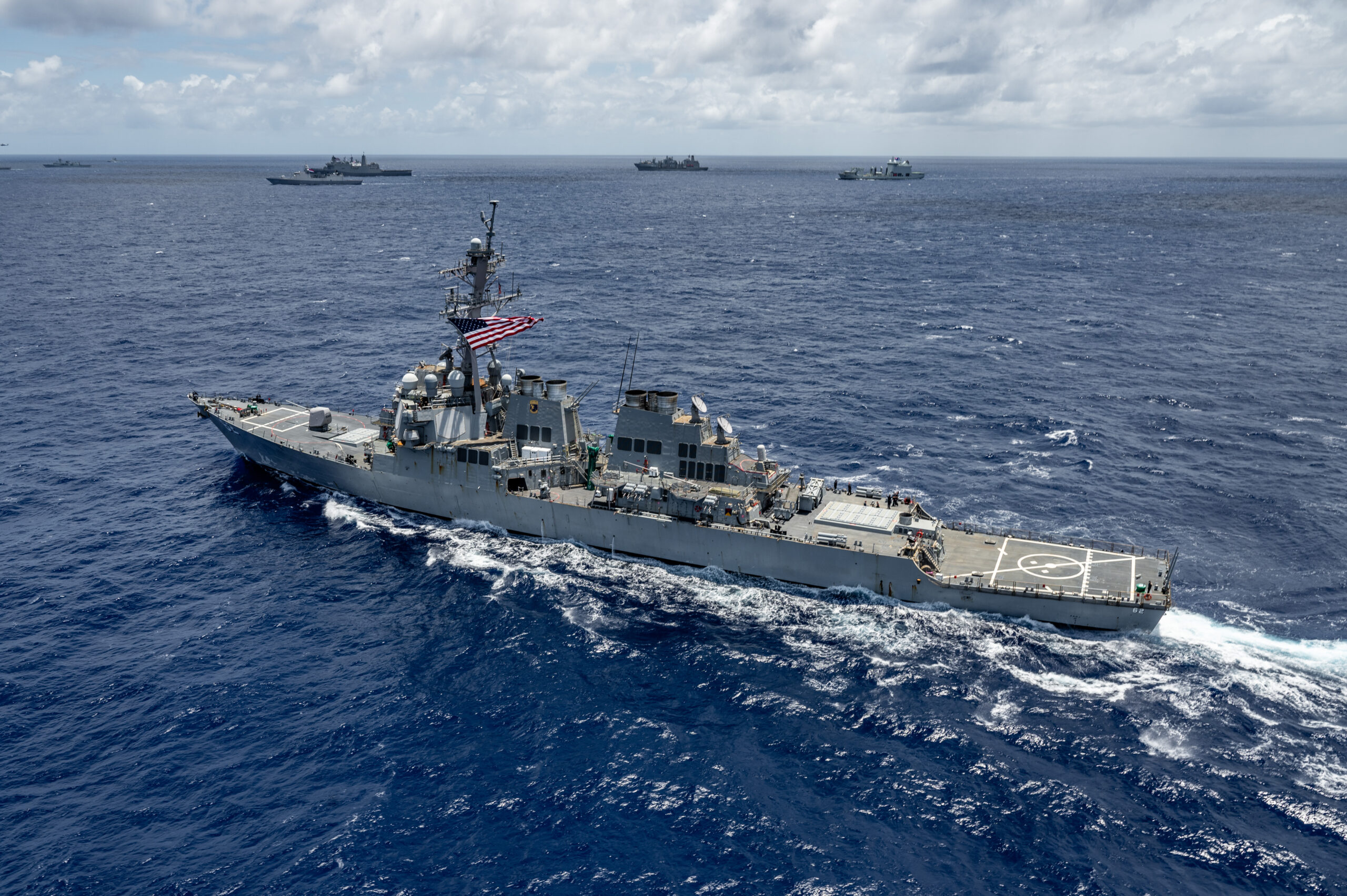 Arleigh Burke-class guided-missile destroyer USS Fitzgerald (DDG 62) sails in formation July 22, off the coast of Hawaii during Exercise Rim of the Pacific (RIMPAC) 2024. Twenty-nine nations, 40 surface ships, three submarines, 14 national land forces, more than 150 aircraft and 25,000 personnel are participating in RIMPAC in and around the Hawaiian Islands, June 27 to Aug. 1. The world's largest international maritime exercise, RIMPAC provides a unique training opportunity while fostering and sustaining cooperative relationships among participants critical to ensuring the safety of sea lanes and security on the world's oceans. RIMPAC 2024 is the 29th exercise in the series that began in 1971. (U.S. Navy photo by Mass Communication Specialist 1st Class John Bellino)