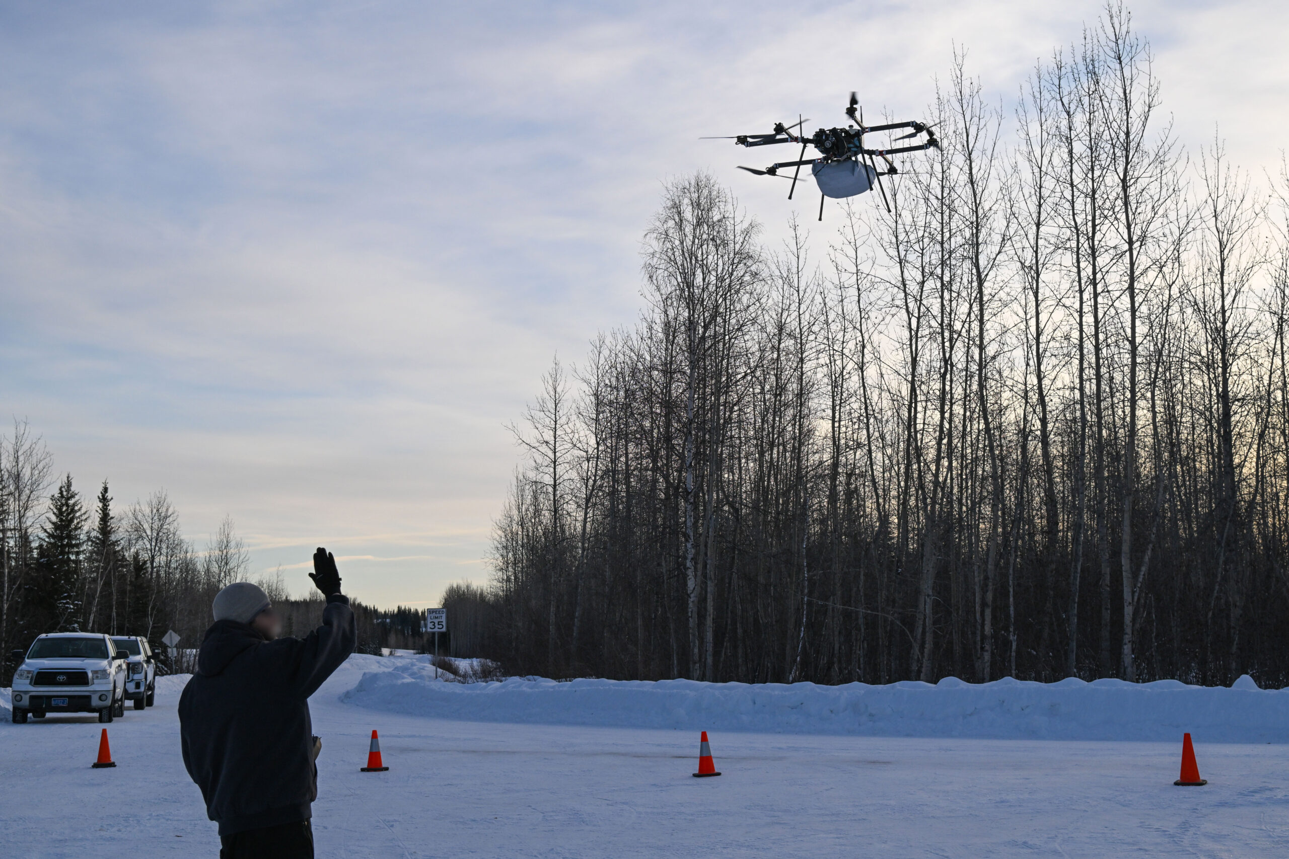 Special Operations Forces Arctic Medic (SOFAM) participants pilot a supply drone during a simulated casualty near Fort Wainwright, Alaska, Feb. 20, 2025. SOFAM 2025 hosted more than 100 participants from SOF and Allied and Interagency partners to improve tactical and prolonged combat casualty care in austere conditions. (U.S. Coast Guard photo by Petty Officer 2nd Class John Hightower)