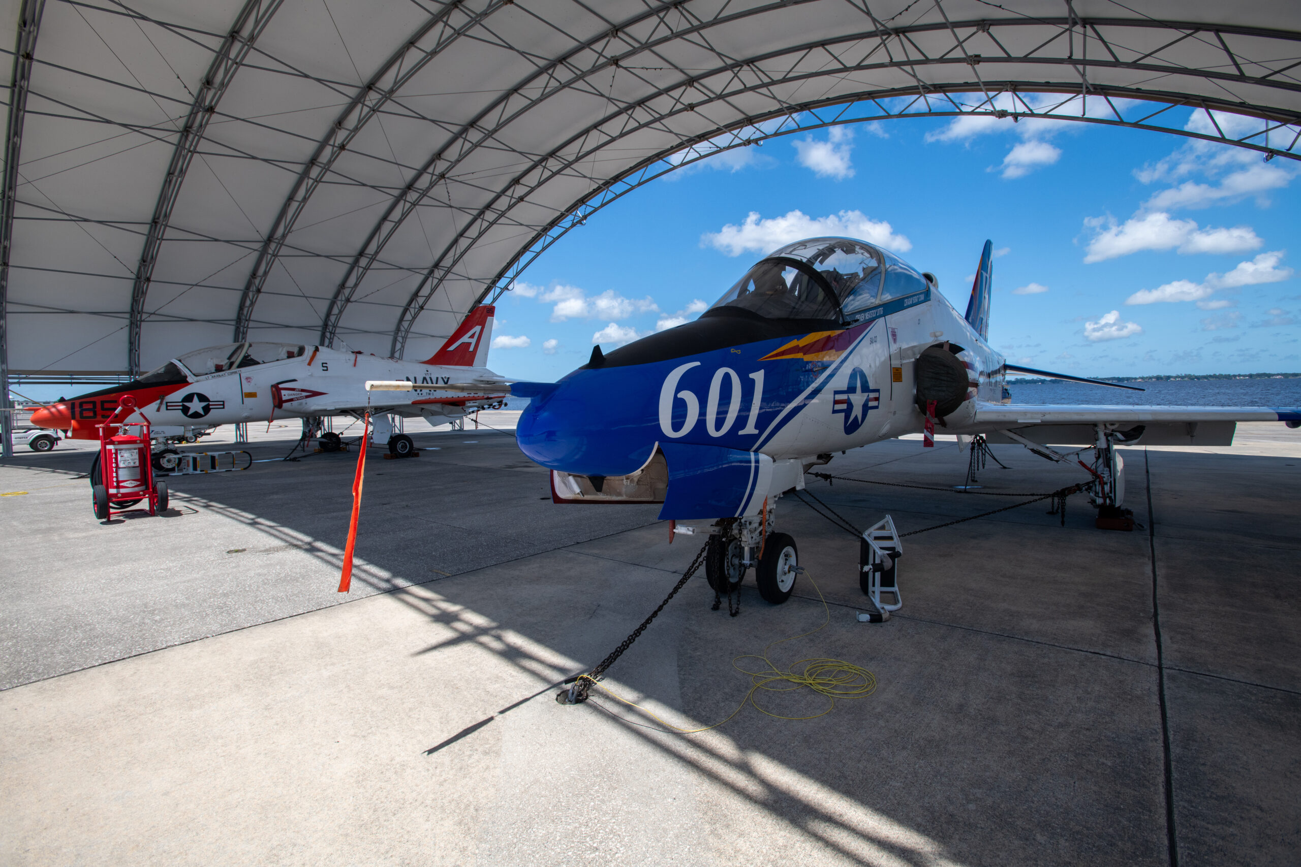250701-N-DG679-1010 JACKSONVILLE, Fla. (July 1, 2025) Fleet Readiness Center Southeast (FRCSE) inducted its first two T-45 Goshawks into the Service Life Extension Program (SLEP) production line, just 13 months after the Navy identified the requirement. The Goshawk is the primary tandem-seat jet trainer used by the Navy and Marine Corps for pilot carrier qualification. (U.S. Navy Photo by Toiete Jackson)