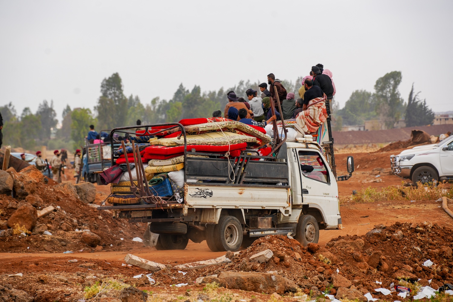 Around 1,500 people from Bedouin tribal families who had been held in Sweida governorate were evacuated under a ceasefire agreement, following fierce clashes between tribal forces and Druze gunmen