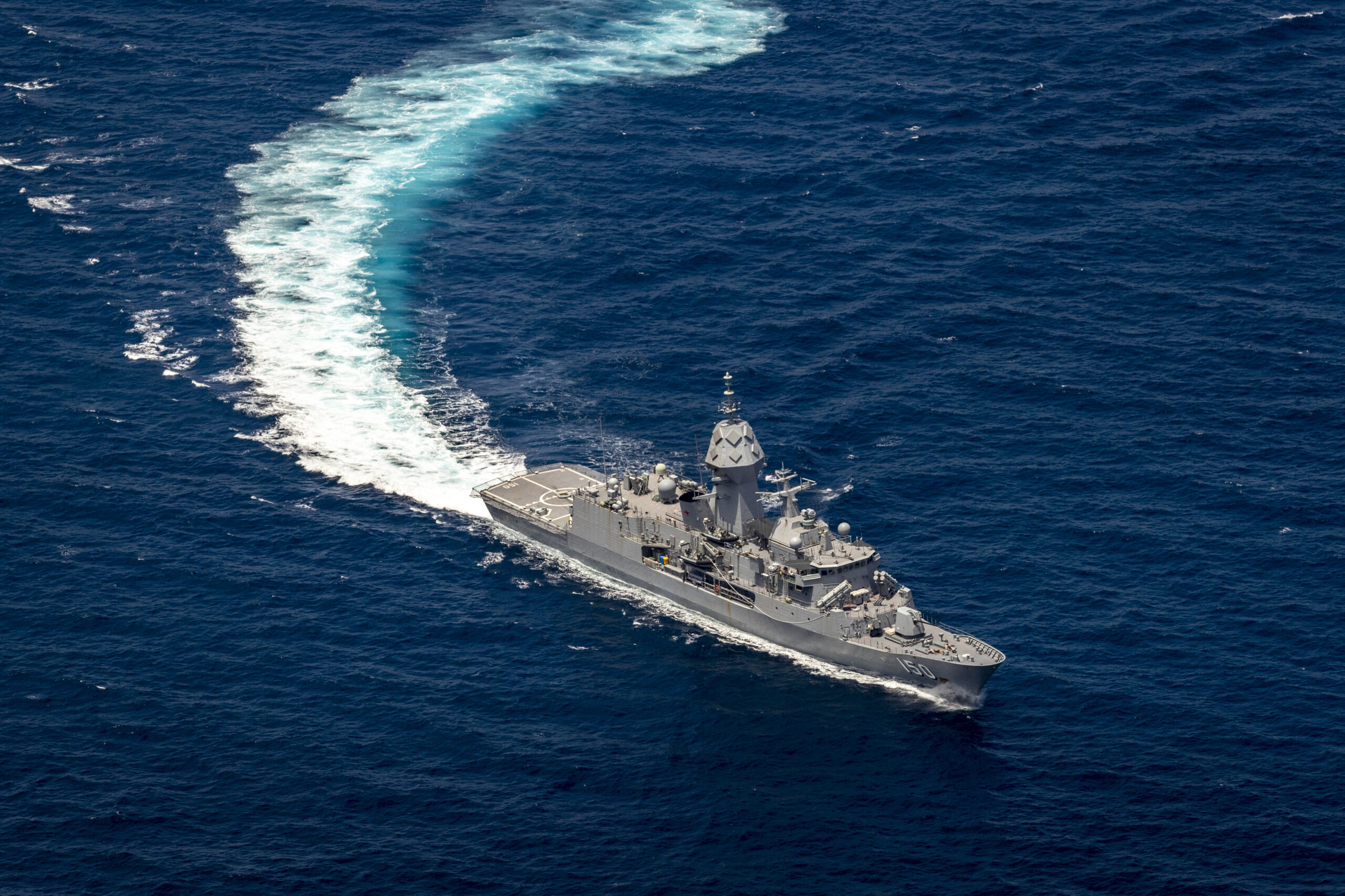 HMAS Anzac conducts maritime manoeuvres during the Indo-Pacific Endeavour 21 deployment. *** Local Caption *** Indo-Pacific Endeavour 21 (IPE21) is Australias flagship regional engagement activity, reinforcing Australias strong and enduring partnerships in Southeast Asia. Centred on a maritime task group, IPE21 involves HMA Ships Canberra and Anzac and approximately 700 people, including Australian Defence Force and civilian defence personnel, and sea riders from partner nations. Engagements have been modified in response to the COVID-19 pandemic and will be carried out primarily through contactless port visits, and will include a range of virtual workshops and at-sea activities.