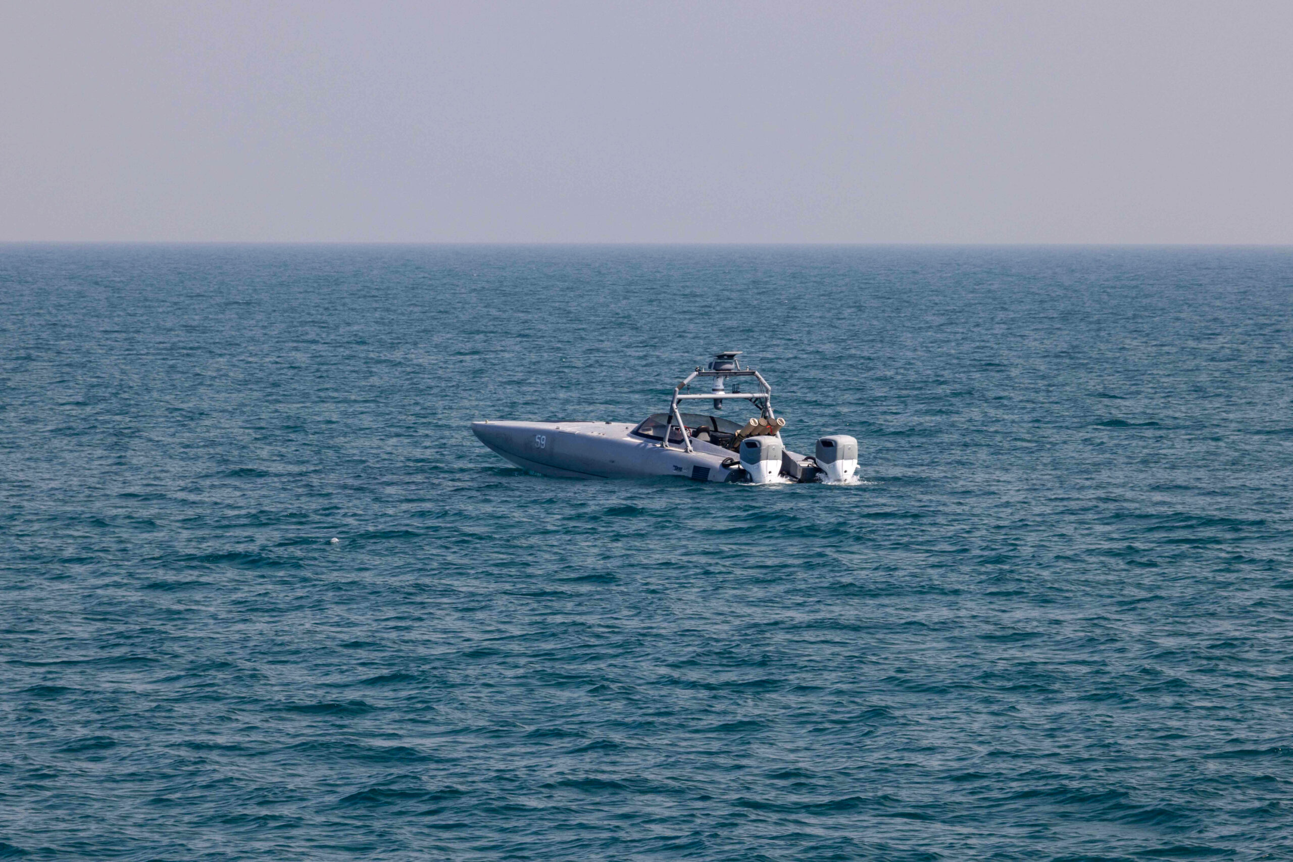 241105-A-BO737-1037 U.S. CENTRAL COMMAND AREA OF RESPONSIBILITY (Nov. 5, 2024) An unmanned surface vessel, equipped with an aerial missile system, sails to its position for launch during exercise Digital Talon 3.0 in the U.S. Central Command area of responsibility. (Official U.S. Army photo)