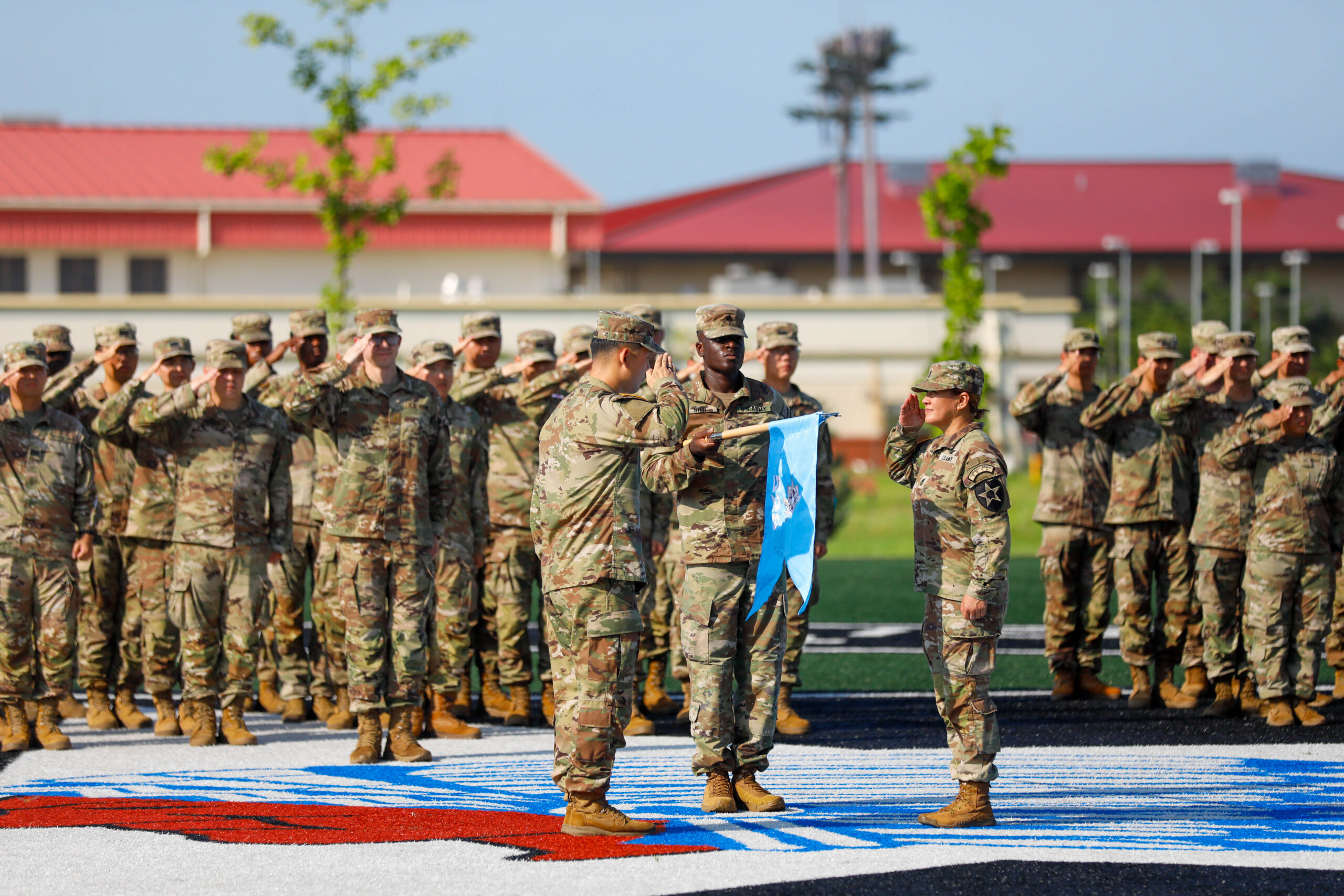 U.S. Army soldiers assigned to the 528th Military Intelligence Company, 2nd Infantry Division/ROK-U.S. Combined Division, uncase the unit guidon during the unit's activation ceremony August 5, 2025, on Camp Humphreys, South Korea. The ceremony was held to commemorate the establishment of the new unit within the 2nd Infantry Division/ROK-U.S. Combined Division. (U.S. Army photo by Pfc. Wilfred Salters Jr.)