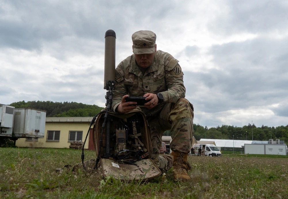US soldier configures the Beast+ electronic warfare system during Combined Resolve 25-02 at the Joint Multinational Readiness Center on Hohenfels Training Area, Hohenfels, Germany