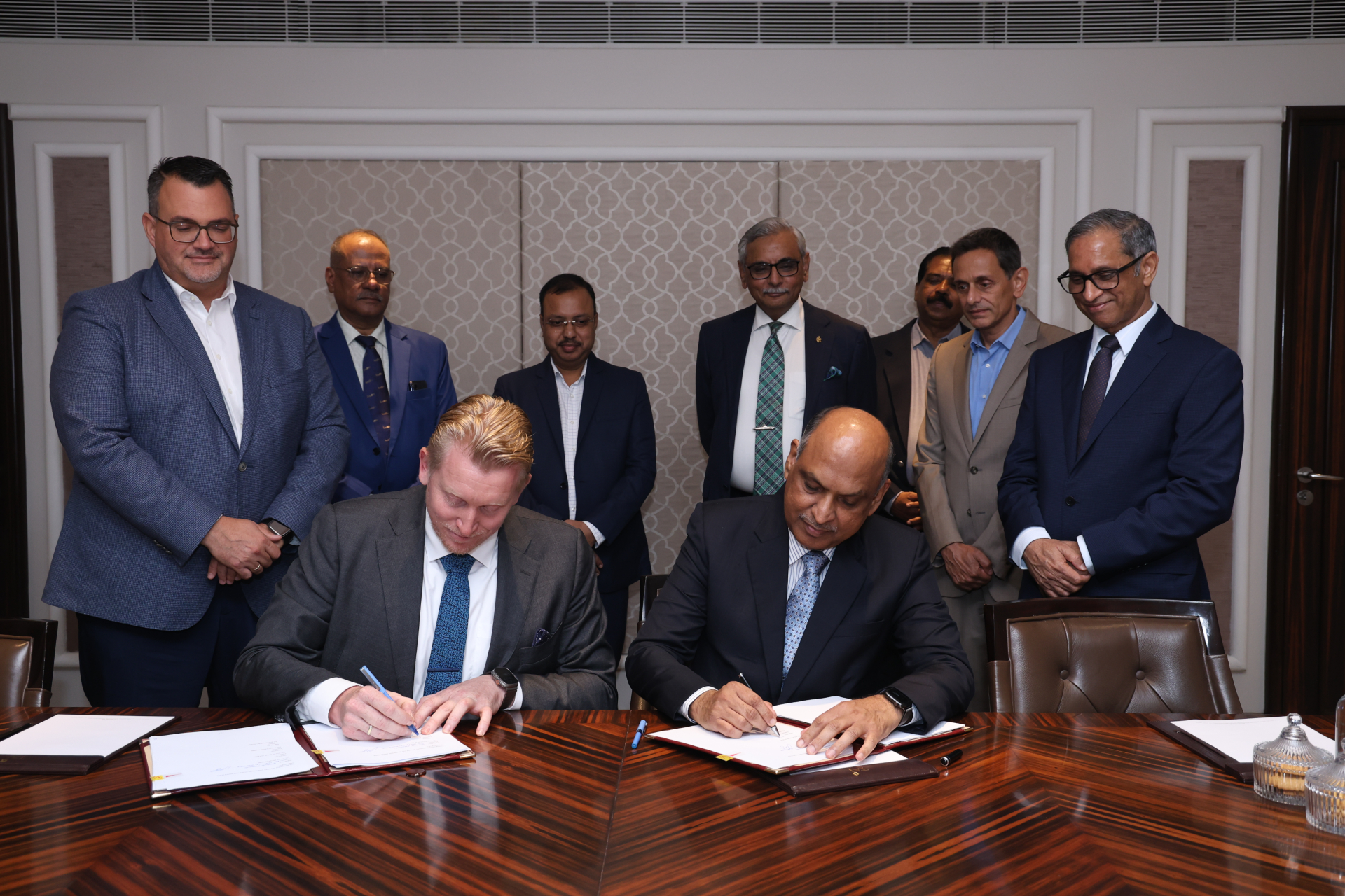 Thyssenkrupp Marine Systems (TKMS) and Indian defense industry representatives signing cooperative agreements. Photo: TKMS