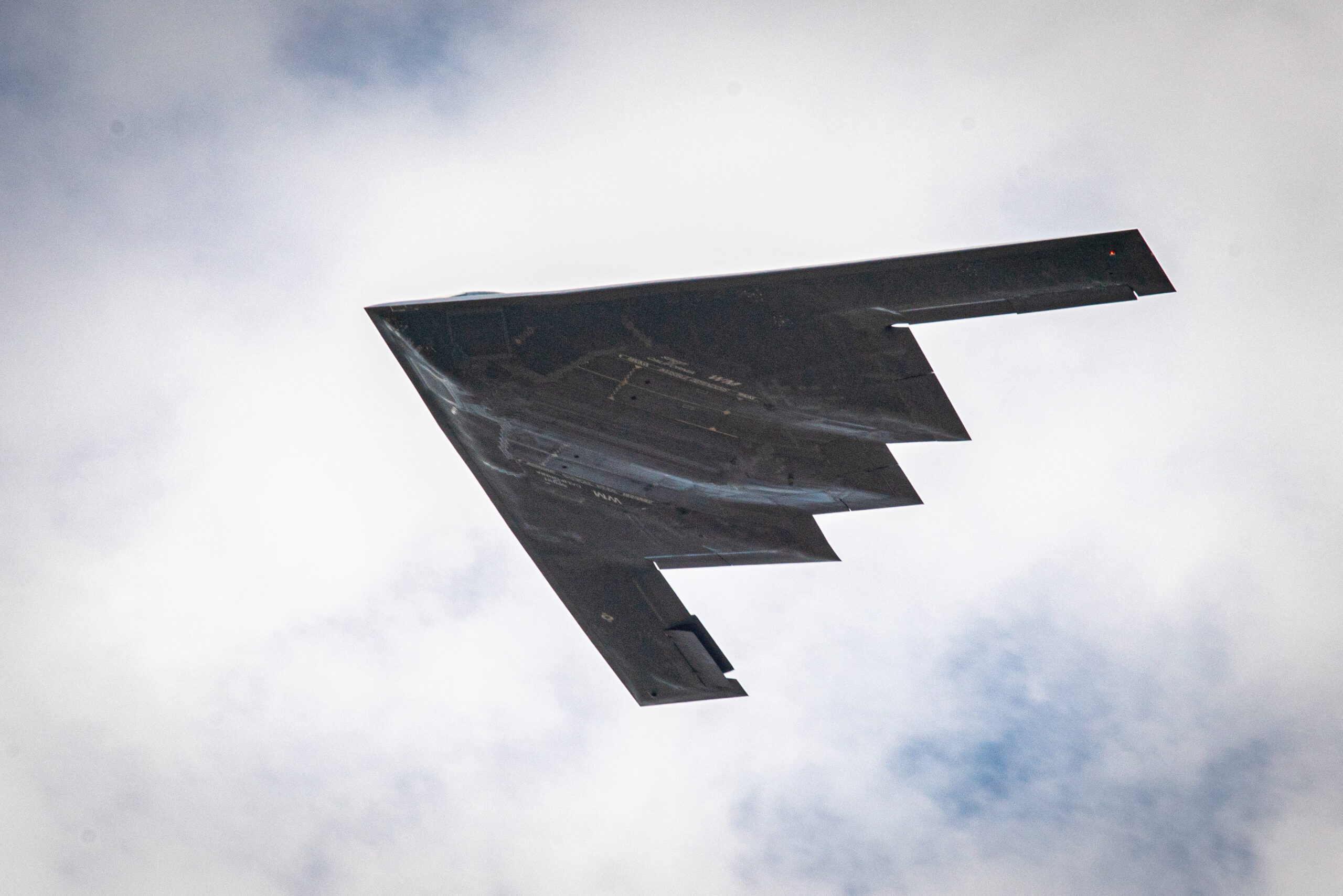 A B-2 Spirit stealth aircraft flies overhead during the Speed of Sound Airshow at Rosecrans Memorial Airport in St. Joseph, Missouri, May 2, 2020. The air show was hosted by the 139th Airlift Wing, and city of St. Joseph to thank the community for their support. The air show committee estimated around 30,000 people attended during the weekend performances in which the United States Air Force Thunderbirds Air Demonstration Squadron were featured. (U.S. Air National Guard photo by Tech. Sgt. Patrick Evenson)