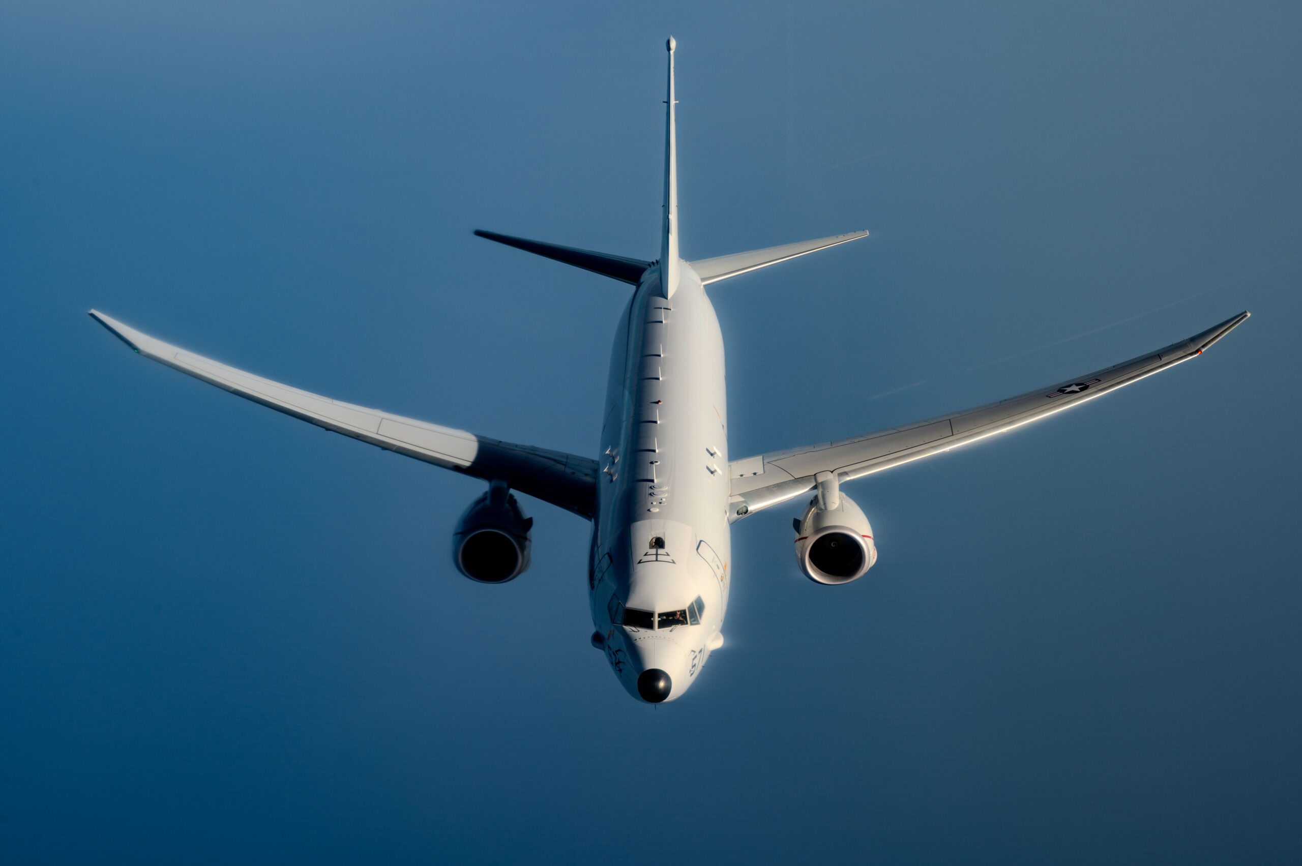 A U.S. Navy P-8A Poseidon flies a routine mission over the U.S. Central Command area of responsibility, Feb. 28, 2025. The P-8A Poseidon is the U.S. Navy’s multi-mission maritime patrol and reconnaissance aircraft, conducting long-range anti-submarine warfare, anti-surface warfare, intelligence, surveillance and reconnaissance. (U.S. Air Force photo by Staff Sgt. Jackson Manske)