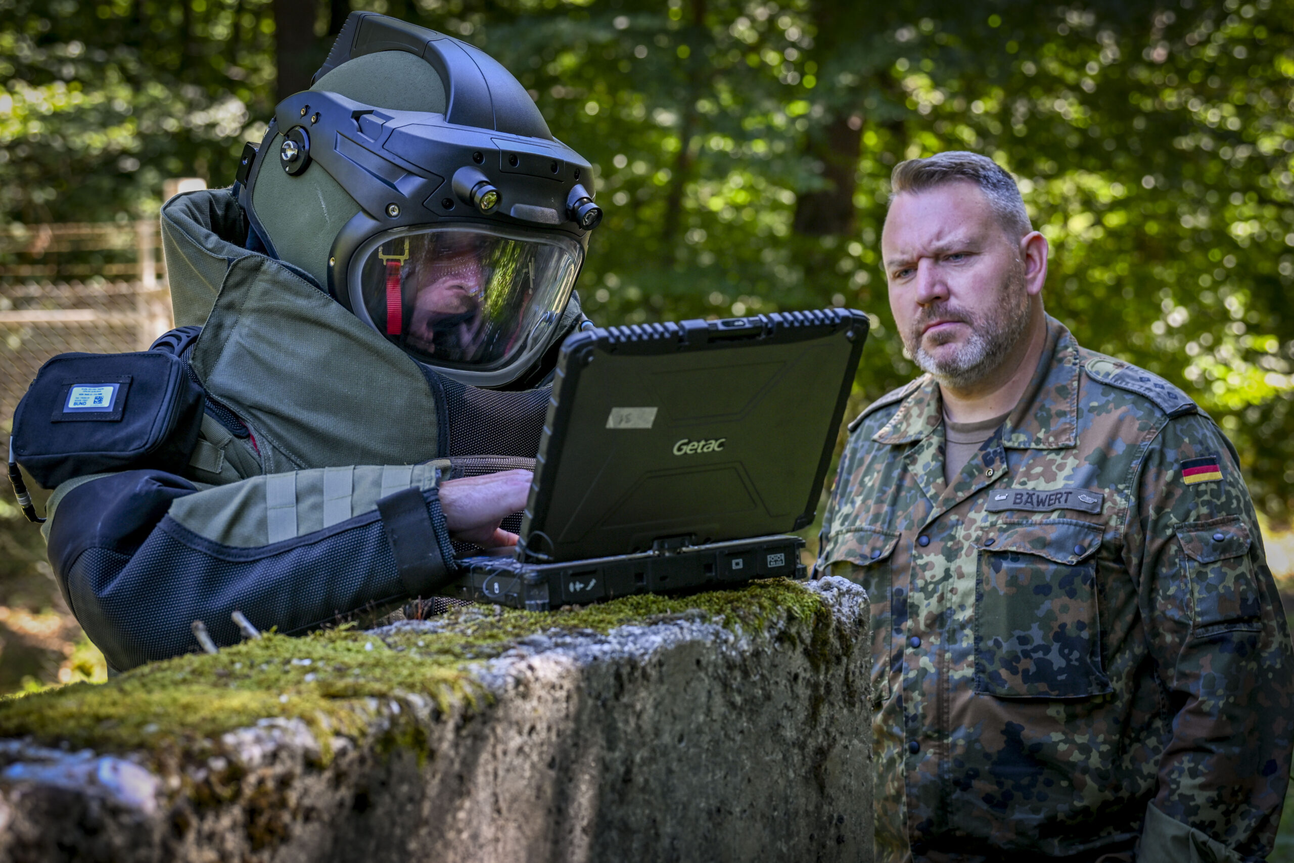 A German explosive ordnance disposal team members looks at an X-ray of an explosive device during the Eifel Krabben Improvised Explosive Device Rodeo at Spangdahlem Air Base, Germany, Aug. 18, 2025. The annual event brought 14 explosive ordnance disposal teams from 10 partner nations together to share expertise, test skills and enhance allied cooperation. (U.S. Air Force photo by Senior Airman Haiden Morris)