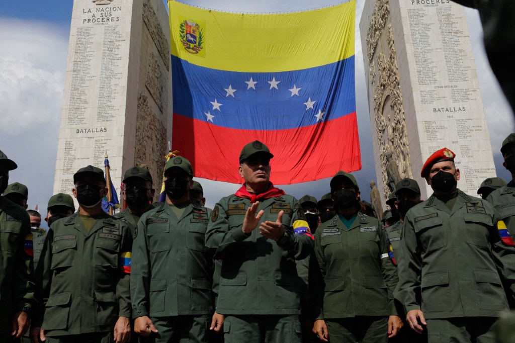 Defense Minister Vladimir Padrino Lopez participates in the march to commemorate the 30th anniversary of February 4, 1992, in Caracas, Venezuela.