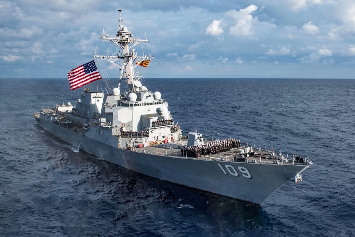 Sailors aboard the Arleigh-Burke class guided-missile destroyer USS Jason Dunham (DDG 109) pose for a command photo Dec. 2, 2018.