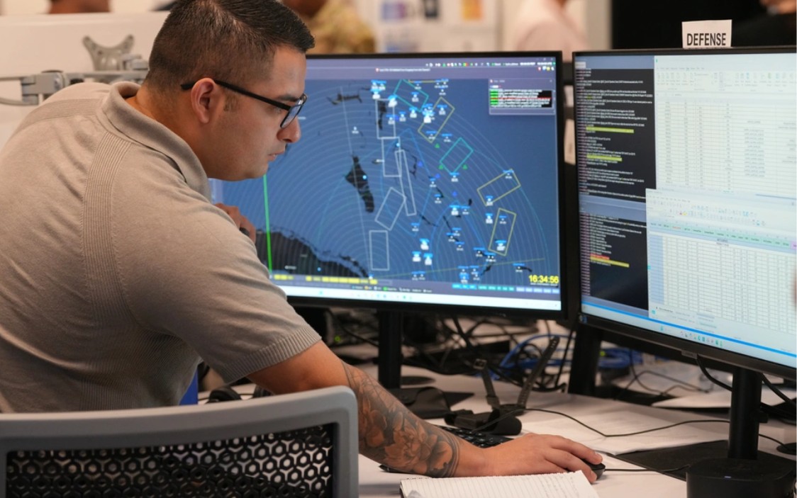 A US Air Force air battle manager participates in the Department of the Air Force’s Advanced Battle Management System Cross-Functional Team second Decision Advantage Sprint for Human-Machine Teaming, or DASH.