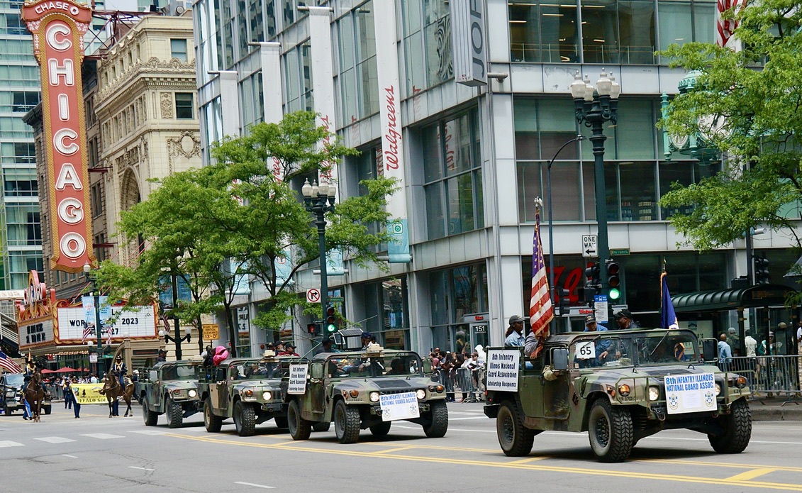 Members of the 8th Infantry Regiment Illinois National Guard Association ride in Illinois National Guard vehicles during the Chicago Memorial Day Parade on May 27, 2023. The association was started by Illinois Army National Guard Veterans dedicated to keeping the history of the Illinois National Guard's all-Black 8th Infantry Regiment alive. The association gives thousands of dollars worth of scholarships to deserving local high school seniors each year. Maj. Gen. Rodney Boyd, the Assistant Adjutant General - Army of the Illinois National Guard and Commander of the Illinois Army National Guard, served as the Grand Marshal of the Chicago Memorial Day Parade on May 27, 2023. Boyd grew up on the South Side of Chicago and is the highest-ranking officer of color in the history of the Illinois National Guard.