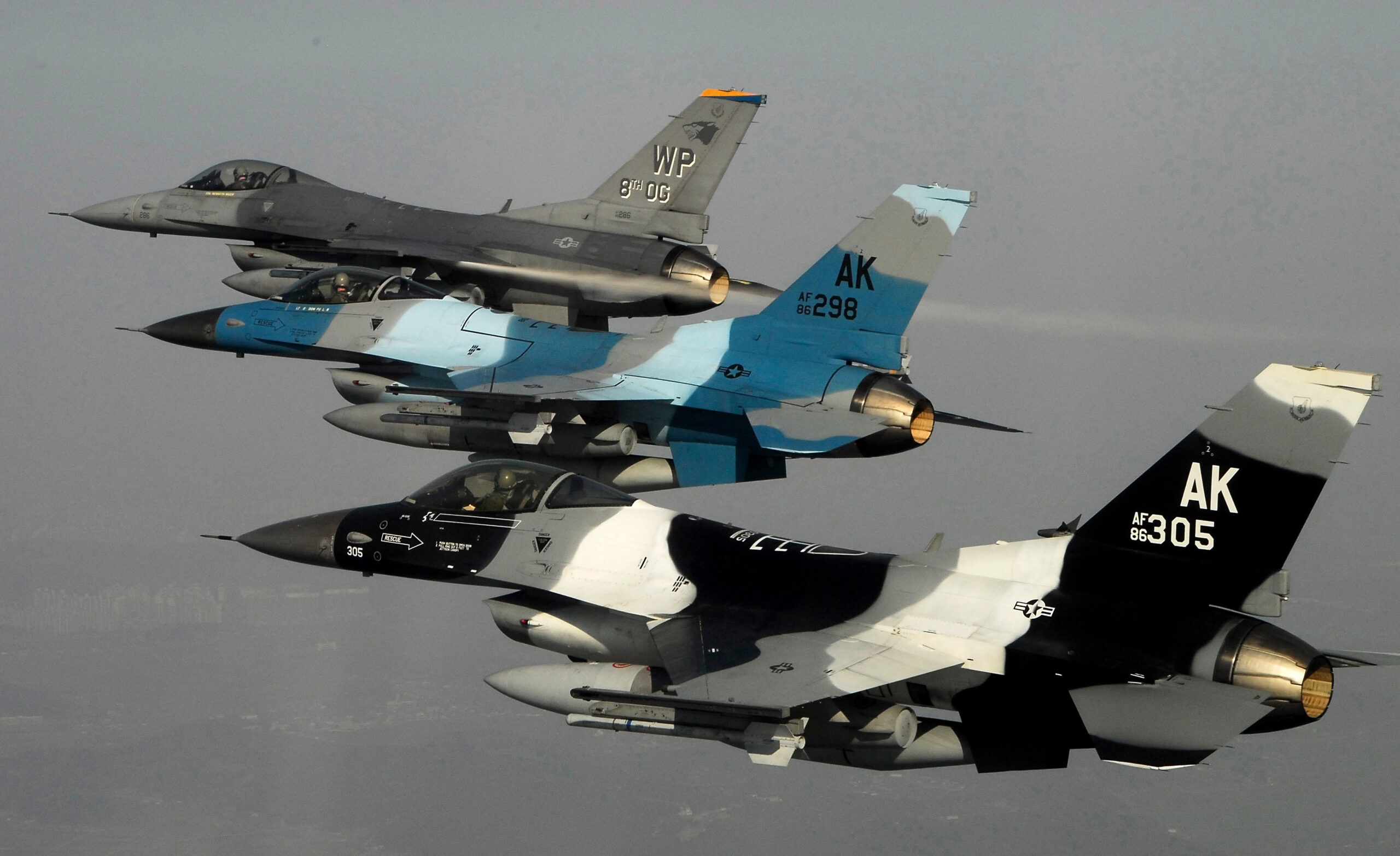Three U.S. Air Force F-16 Fighting Falcon Block 30 aircraft from the 80th Fighter Squadron fly in formation over South Korea during a training mission on Jan. 9, 2008. The squadron will be upgrading to F-16 Block 40 aircraft under the common configuration implementation program, which increases mission capability and combat readiness by utilizing newer airframes and avionics. (DoD photo by Tech. Sgt. Quinton T. Burris, U.S. Air Force. (Released))