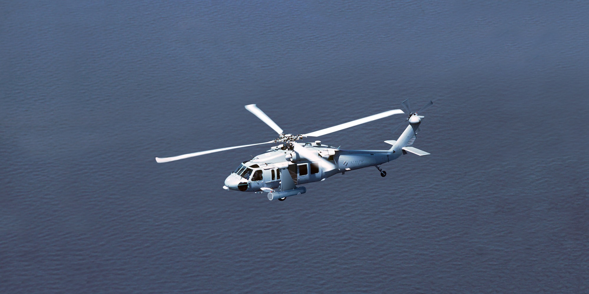 A helicopter equipped with the Airborne Laser Mine Detection System (ALMDS).