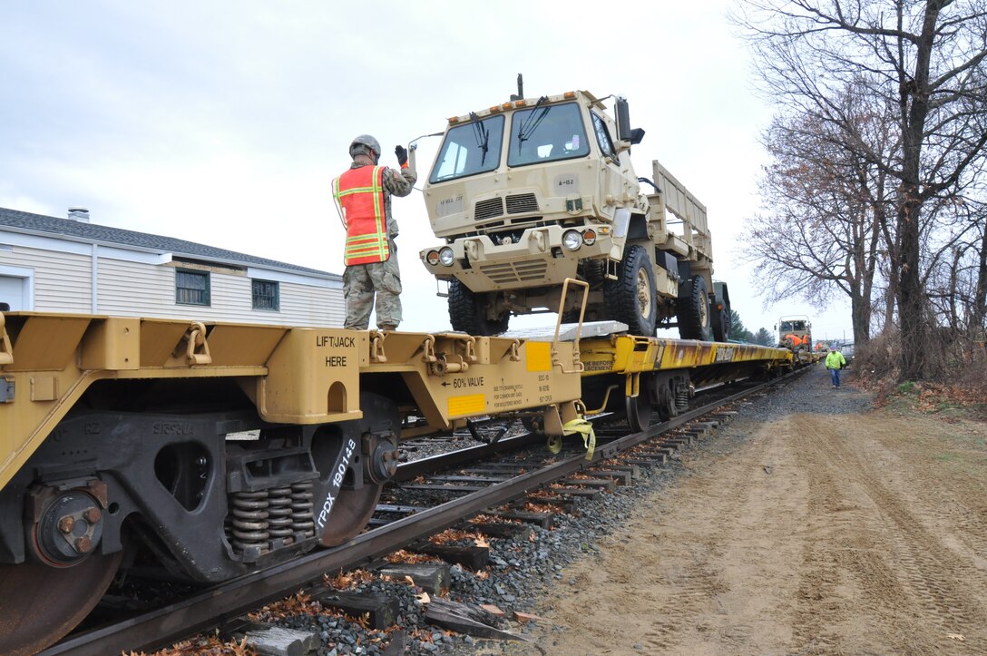 Members of the 1-102nd Infantry conduct rail head operations at Camp Hartell in Windsor Locks, CT