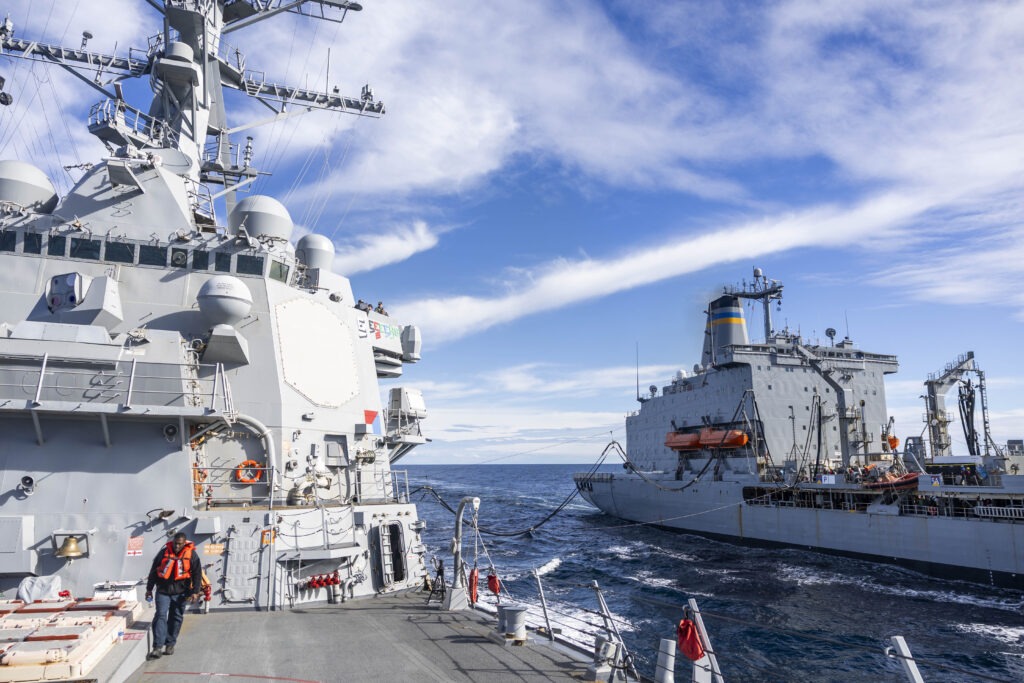 Arleigh Burke-class guided-missile destroyer USS Spruance (DDG 111) conducts a replenishment-at-sea with fleet replenishment oiler USNS Henry J. Kaiser