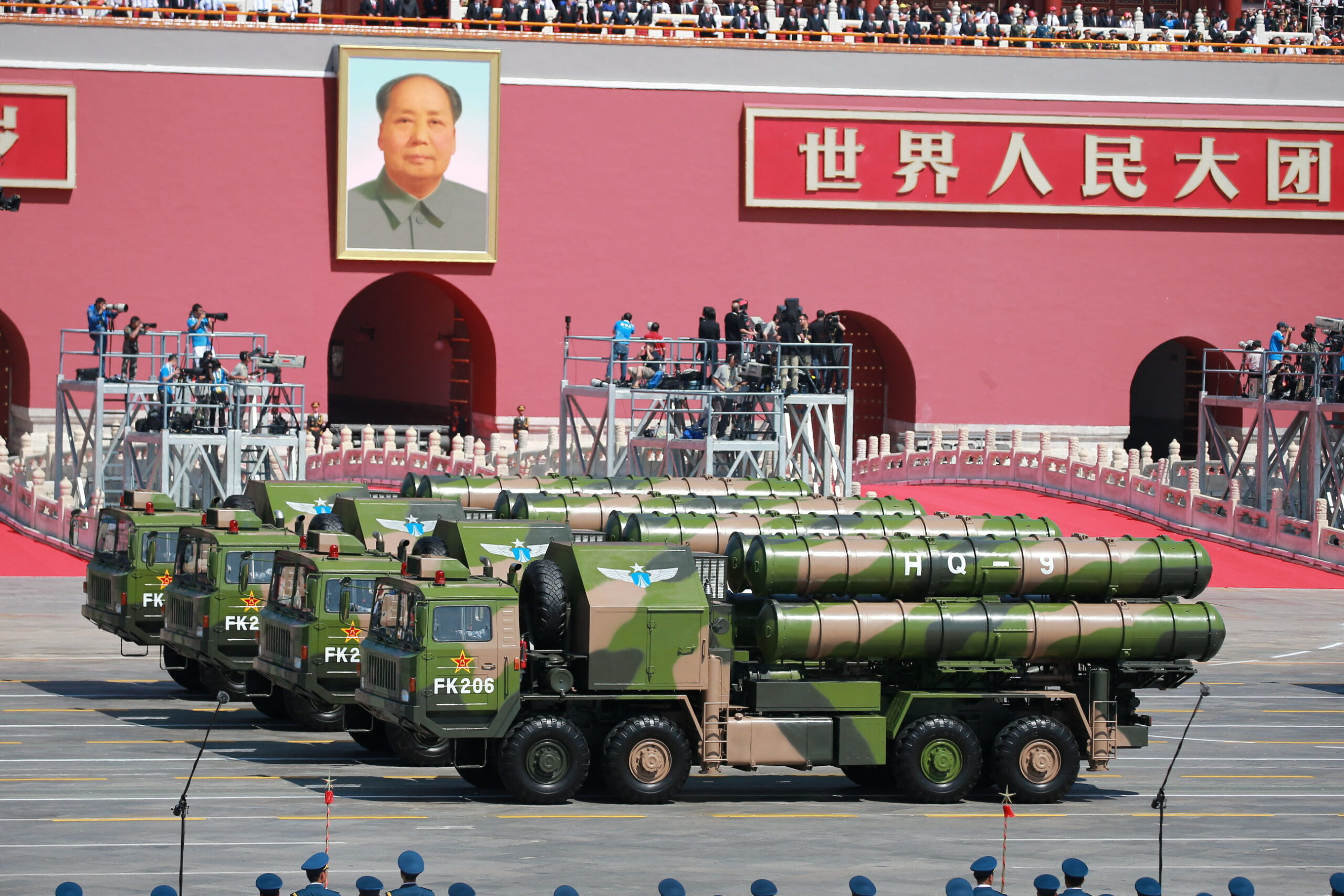 Military vehicles carrying HQ-9 medium- to long-range surface-to-air missiles march past the Tiananmen Rostrum during the military parade to commemorate the 70th anniversary of the victory in the Chinese People's War of Resistance Against Japanese Aggression in Beijing, China, 3 September 2015. China has pledged to cut the number of troops in its army by 300,000, in an unexpected announcement made by Chinese president Xi Jinping on Thursday (3 September 2015). Xi disclosed the news during a speech made before the beginning of a huge military parade in Beijing's Tiananmen Square, held to mark the end of World War II and celebrate China's victory over Japan. Xi said that a 13% cut would be made in the country's 2.3 million-armed forces, stressing that China was committed to peace, although he gave no indication of when it would be implemented. 