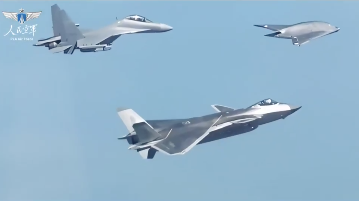 GJ-11 uncrewed combat aerial vehicle flying in formation with the J-20 and J-16D aircraft.