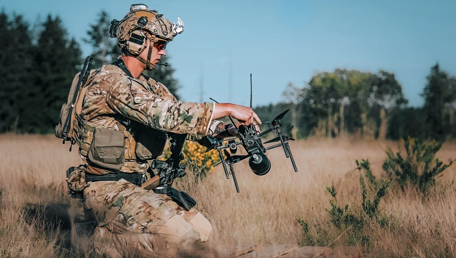 A soldier from the Army’s 75th Ranger Regiment prepares a Neros Archer Strike drone for flight. Army photo by Spc. Luke Sullivan.