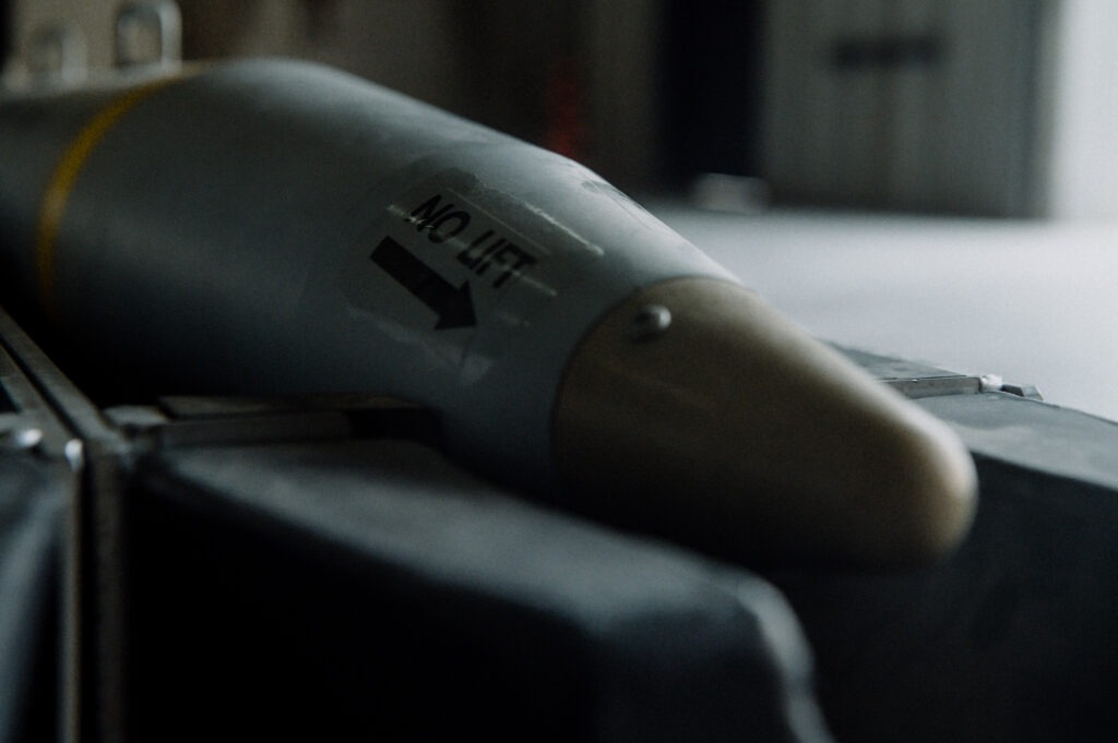 A GBU-39 small diameter bomb sits in the munitions storage area at Al Udeid Air Base, Qatar.