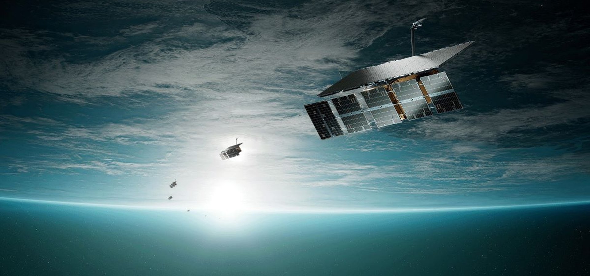Artist's rendering of an ICEYE satellite constellation in space