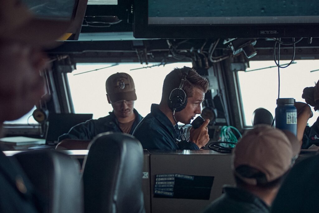 Officers on bridge giving instructions during the USS Zumwalt's final inbound transit.