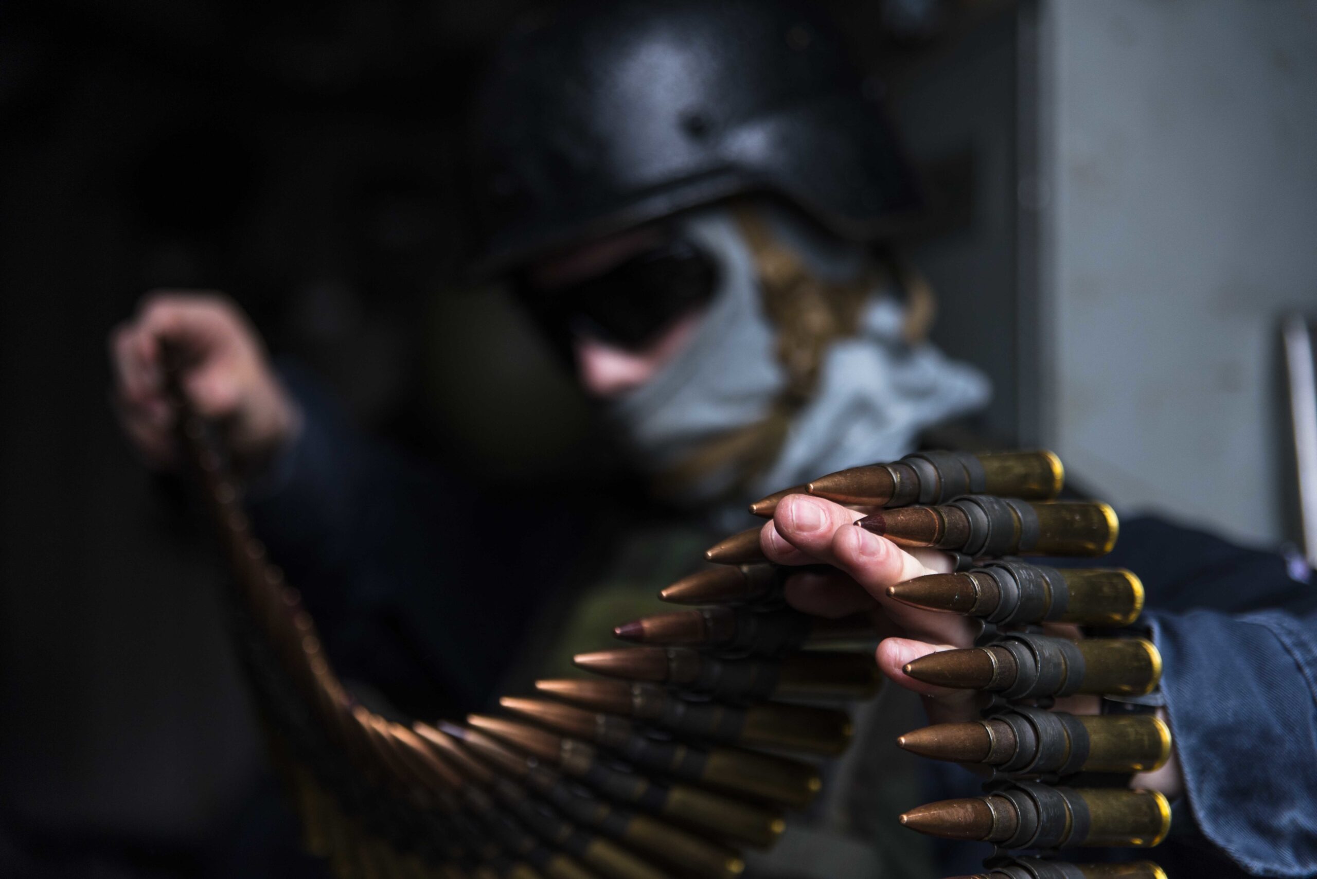 170311-N-JH293-028 WATERS SOUTH OF JAPAN (March 11, 2017) Operations Specialist 2nd Class Grahm Johnson, from Anaheim, Calif., inspects .50-caliber machine gun ammunition aboard the amphibious transport dock ship USS Green Bay (LPD 20) during a defense of the amphibious task force exercise. Green Bay, part of the Bonhomme Richard Expeditionary Strike Group, with embarked 31st Marine Expeditionary Unit, is on a routine patrol, operating in the Indo-Asia-Pacific region to enhance warfighting readiness and posture forward as a ready-response force for any type of contingency. (U.S. Navy photo by Mass Communications Specialist 1st Class Chris Williamson/Released)