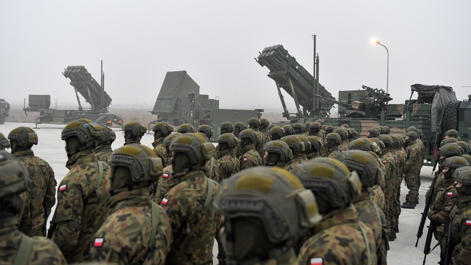 Troops in front of the WISLA air defense system