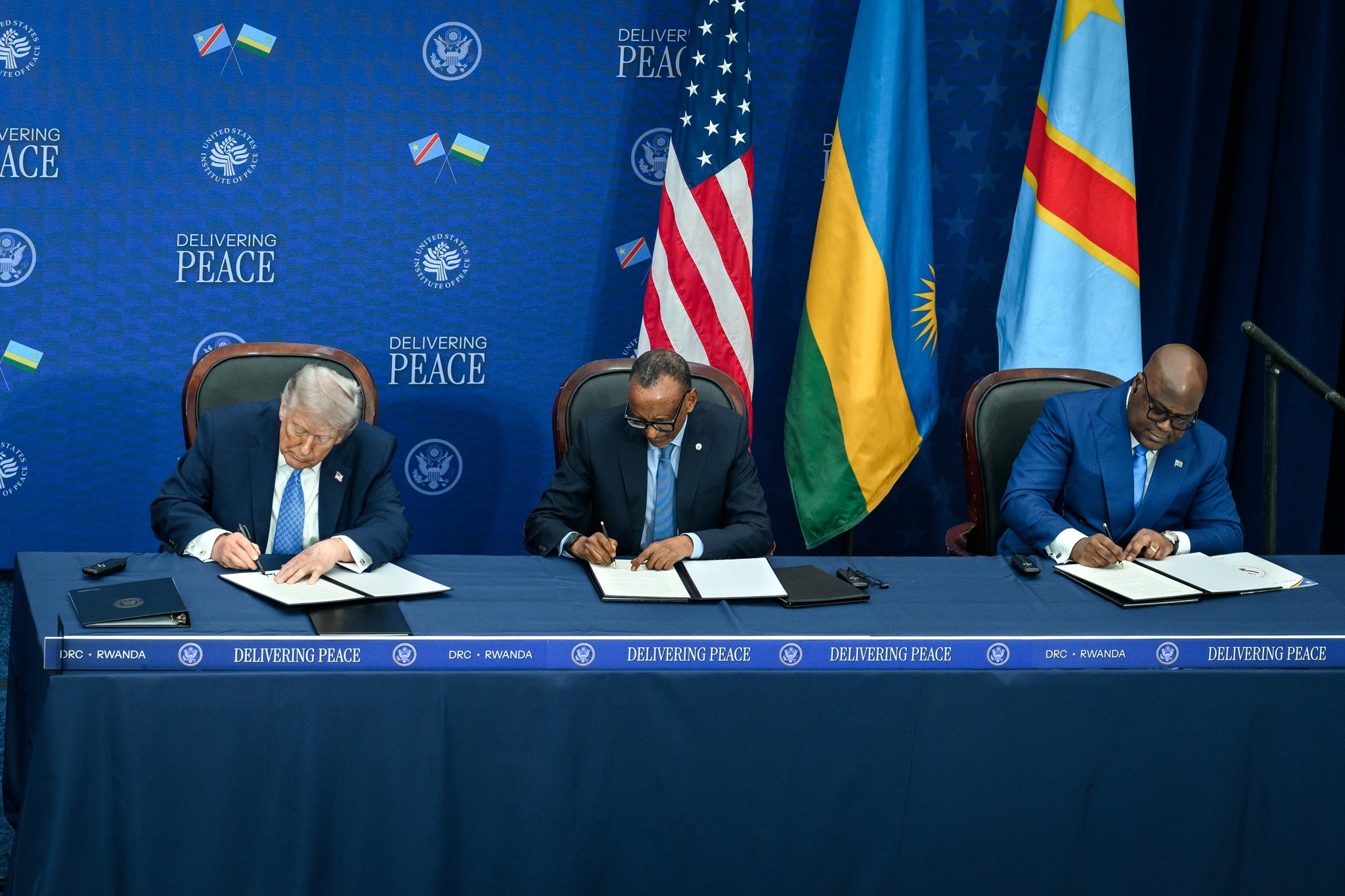President Donald Trump participates in a trilateral signing ceremony of a peace and economic agreement with President Paul Kagame of the Republic of Rwanda and President Felix Tshisekedi of the Democratic Republic of the Congo, Thursday, December 4, 2025, at the United States Peace Institute in Washington, D.C. (Official White House Photo by Daniel Torok)