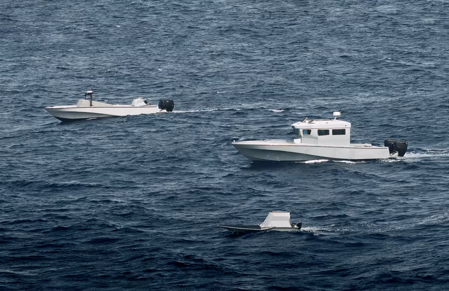 An uncrewed surface vessel operating autonomously at sea, showcasing HavocAI technology designed for coordinated maritime operations and AI-driven naval autonomy