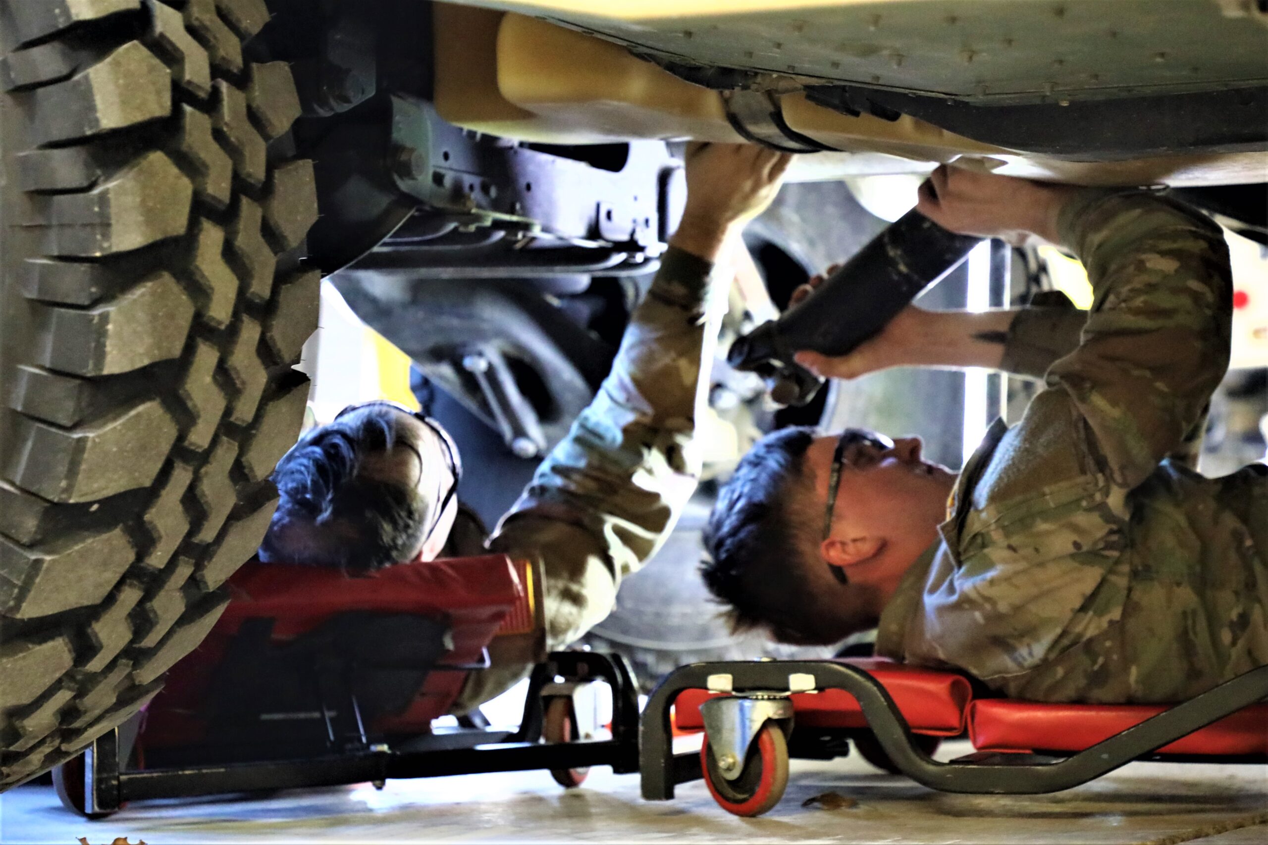 Training in the 91B10 Wheeled Vehicle Mechanic Course is shown March 6, 2024, at the Regional Training Site (RTS)-Maintenance facility at Fort McCoy, Wis. The course description for the 91B course states Soldiers are trained “to perform field-level maintenance on automotive wheeled vehicles, wheeled-vehicle operations,” and they receive an “introduction to troubleshooting; fuel system maintenance; electrical system maintenance; power train maintenance; chassis, suspension, and steering maintenance; brake maintenance; and preventive maintenance checks and services.” 91B students also learn about common maintenance subjects; Test, Measurement, and Diagnostic Equipment; publications; maintenance forms; use and care of tools/power tools; shop safety, automatic fire extinguishing systems; air conditioning; the Common Remotely Operated Weapon Station System; and maintenance discipline. (U.S. Army Photo by Claudia Neve, Public Affairs Office, Fort McCoy, Wis.)
