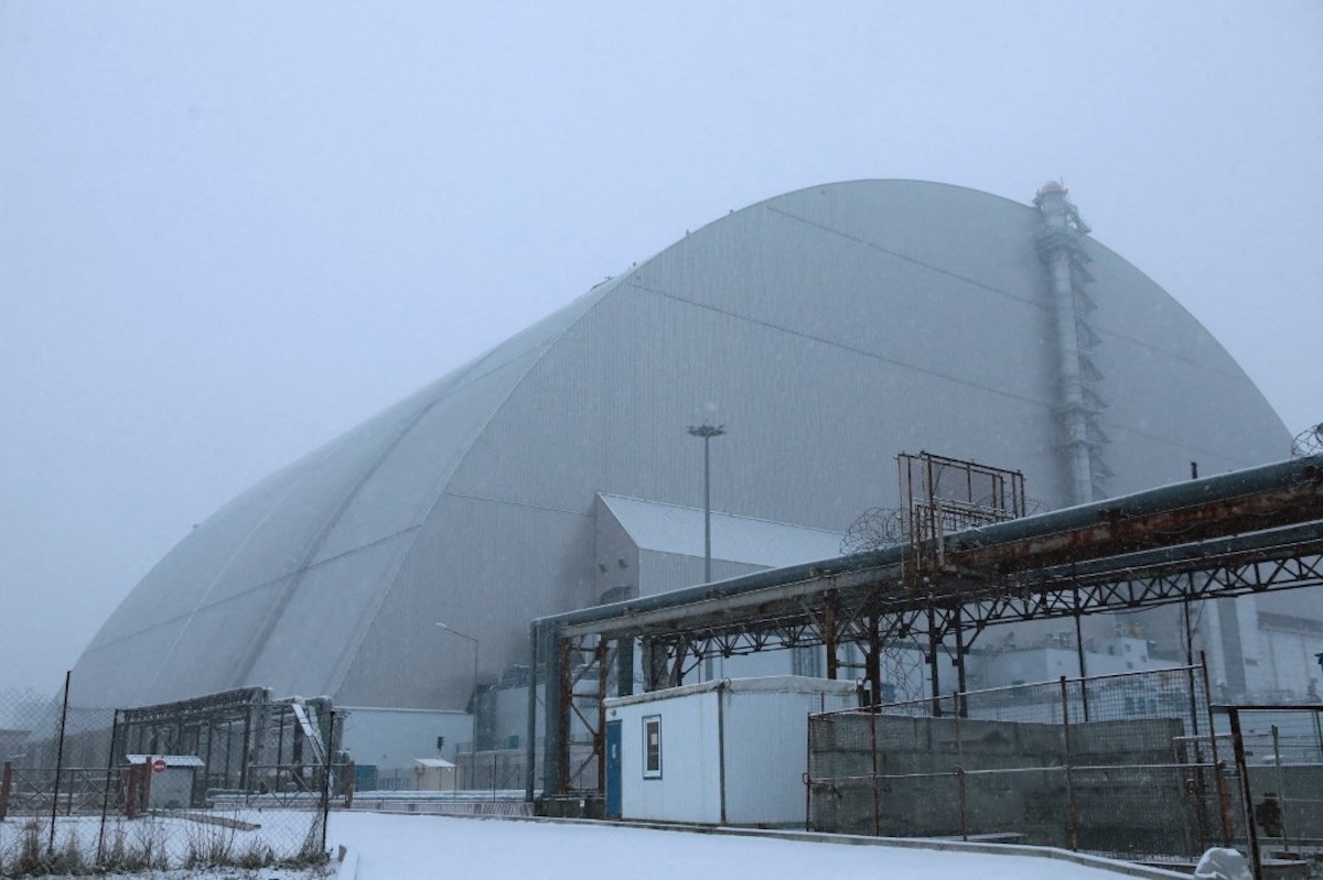 The New Safe Confinement at the Chornobyl Nuclear Power Plant in the Kyiv region, Ukraine, on February 14, 2025, protects the remains of Reactor 4, which was destroyed during the 1986 Chornobyl disaster. The structure was hit by a Russian attack drone with an explosive warhead on Friday night, January 14. (Photo by Volodymyr Tarasov/Ukrinform/NurPhoto)