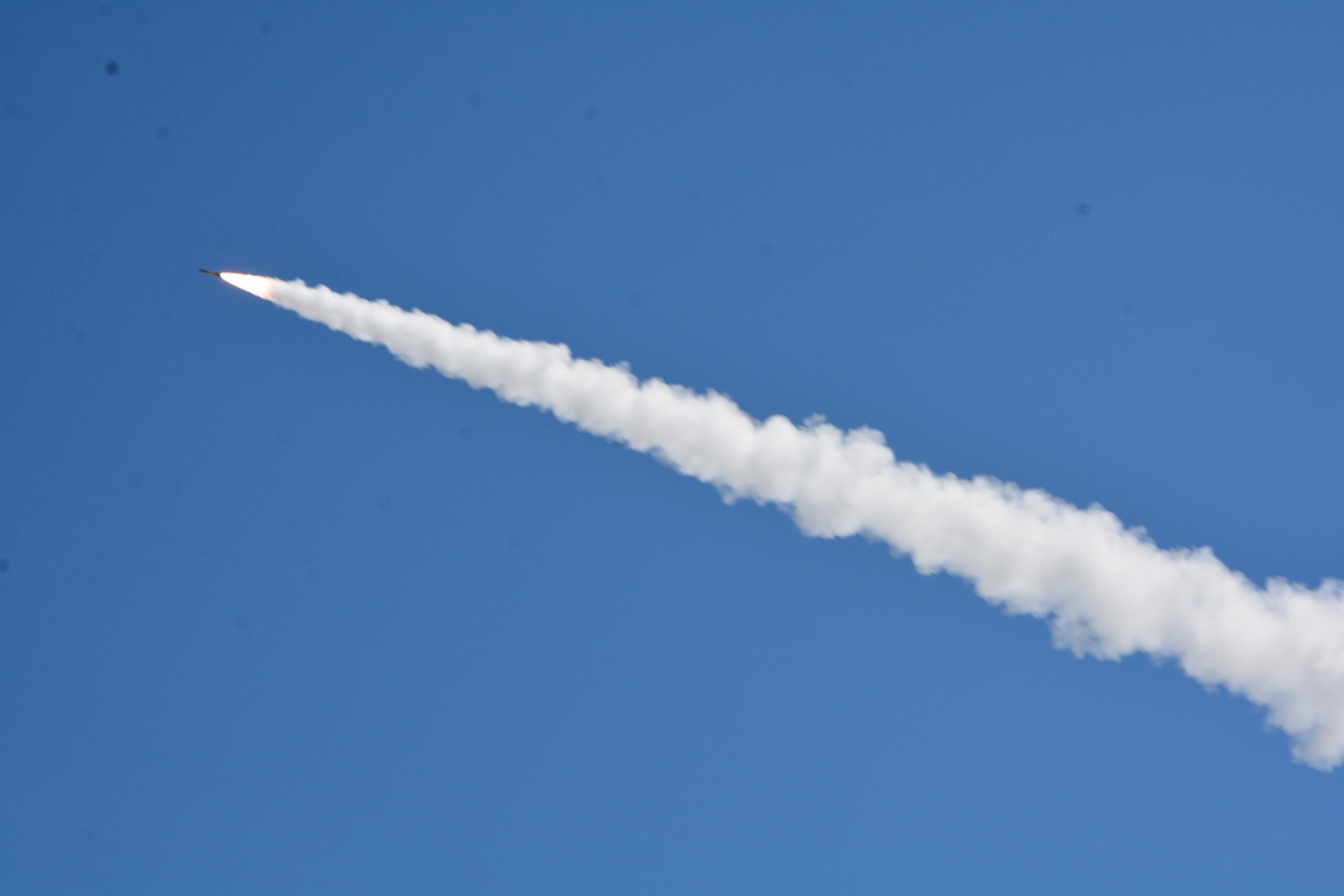 A Guided Multiple Launch Rocket System (GMLRS) fired in the sky