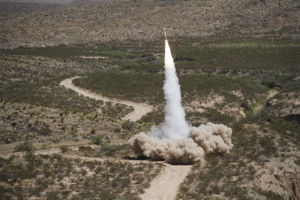 A guided multiple launch rocket system (GMLRS) rocket is launched from a High-Mobility Artillery Rocket System, mounted on a truck