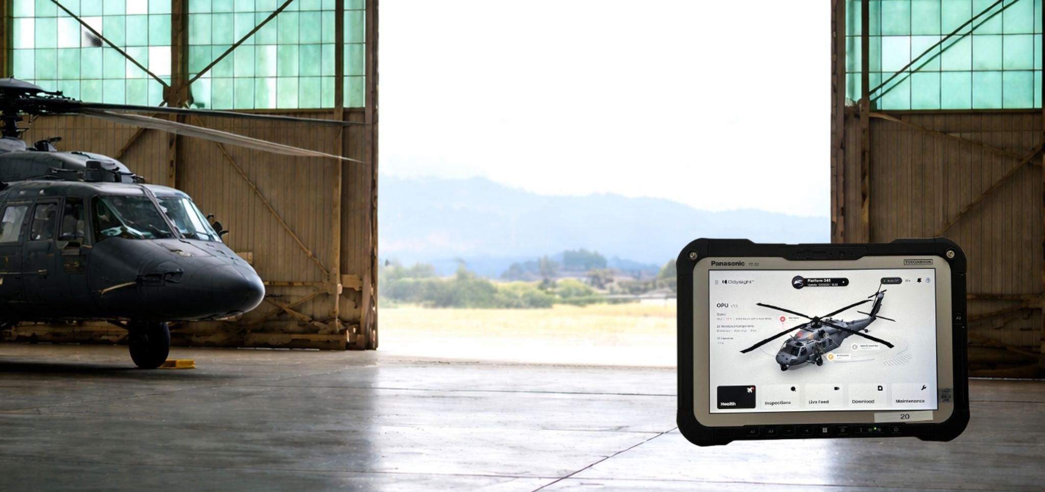 AI predictive maintenance device in front of a military helicopter. Photo: Odysight.ai