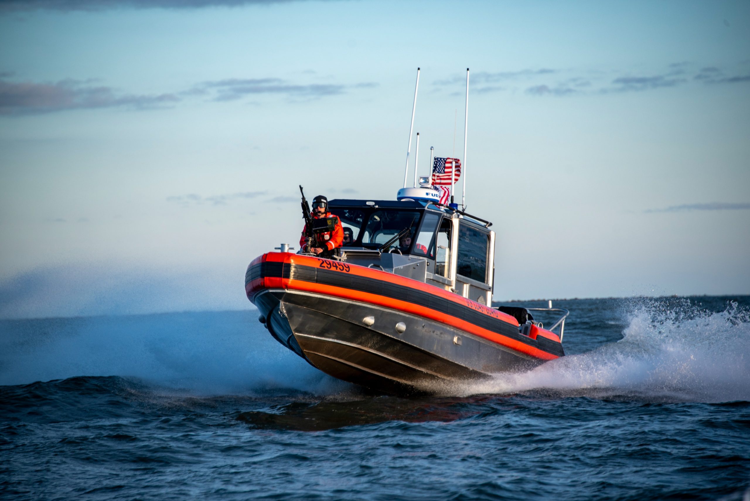 A Coast Guard Station Charleston 29-foot Response Boat - Small crew proceeds toward Station Charleston after completing a cruise ship escort Jan. 30, 2020, in Charleston, South Carolina. Coast Guard Station Charleston crew members often conduct cruise ship escorts as part of the Coast Guard’s port and waterway security mission which protects marine resources and maritime commerce. (U.S. Coast Guard photo by Petty Officer 2nd Class Ryan Dickinson)