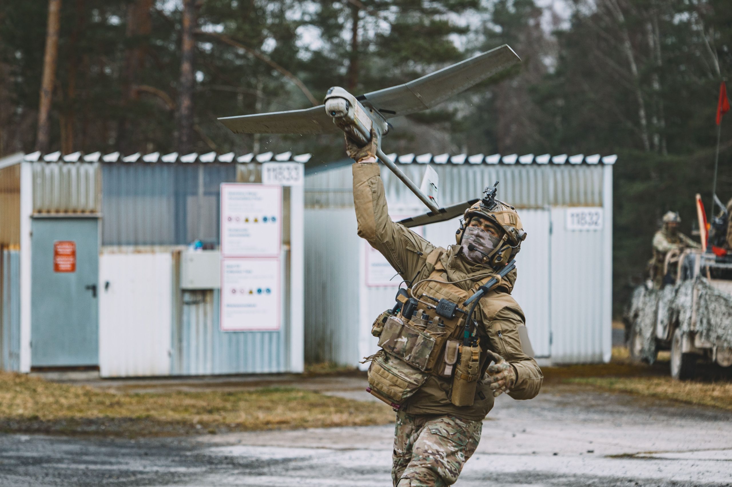 A Belgian Soldier assigned to the Belgian 2nd Commando Battalion conducts a live fire exercise in the 7th Army training Command's (7ATC) Grafenwoehr Training Area, Germany, March 5, 2024. 7ATC enables readiness for all assigned and regionally aligned USAREUR-AF forces, Allies and Partners by conducting live, virtual, and/or constructive training in a fully replicated, multi-domain battlefield.​ 7ATC is uniquely positioned and organized to organically train and resource U.S., Allied and Partner units through the entire training process, tailored to the organization’s mission or nation’s defense security requirements. (U.S. Army photo by Sgt. Christian Carrillo)