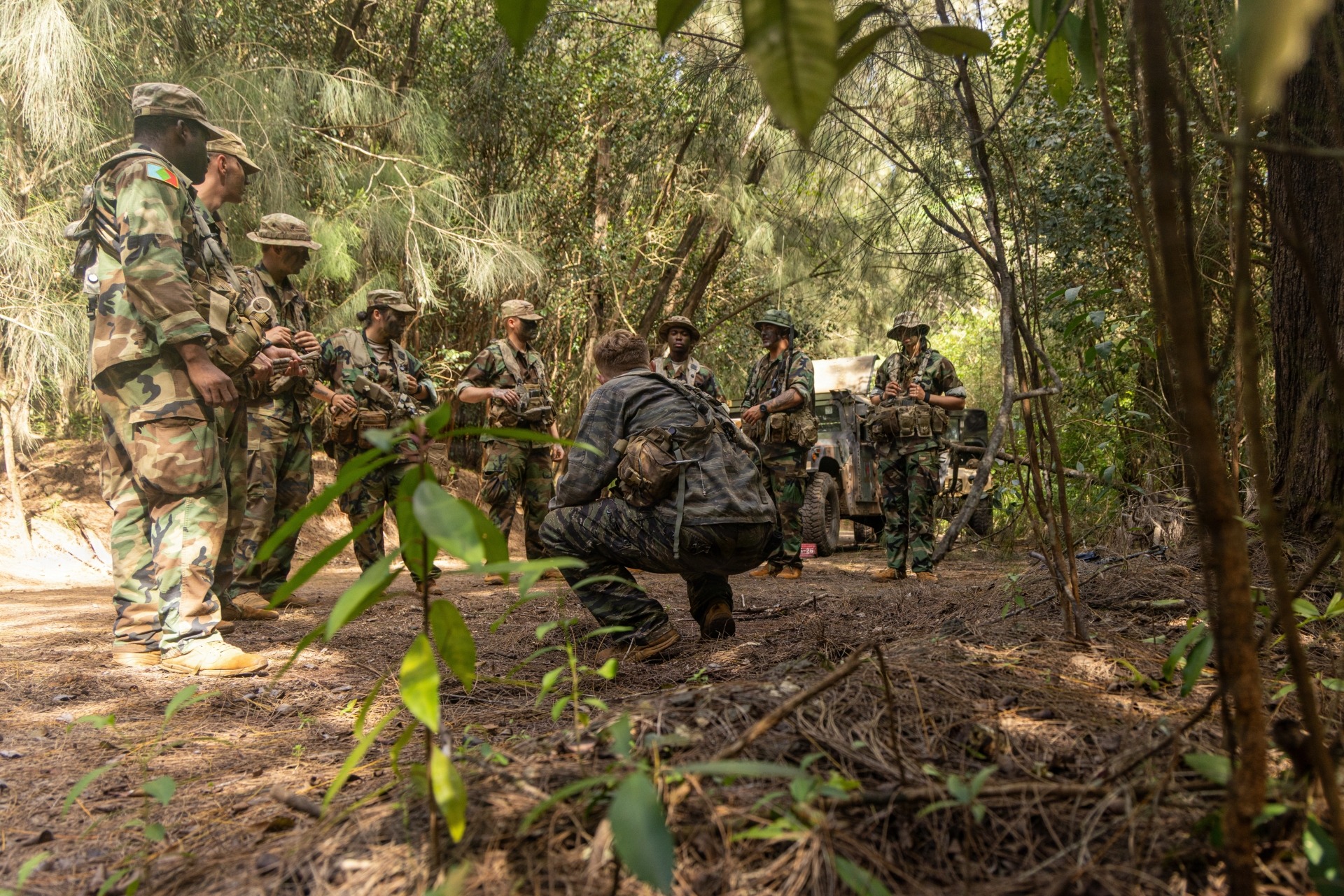 U.S. Army Soldiers assigned to the 1st Battalion, 27th Infantry Regiment, 2nd Mobile Brigade, 25th Infantry Division, familiarize themselves with their roles as the opposing force during the Joint Pacific Multinational Readiness Center Rotation 26-01 at Schofield Barracks, Hawaii, Nov. 6, 2025. The United States Army Pacific (USARPAC) conducted Joint Pacific Multinational Readiness Center (JPMRC) Rotation 26-01 from Nov. 3 - 17, 2025, in and around the Hawaiian island chain. This exercise is designed to validate the combat readiness of the 3rd Mobile Brigade (3MBDE), 25th Infantry Division Artillery (DIVARTY), and the 125th Division Signal Battalion in a joint, multinational, multi-domain training environment. JPMRC 26-01 integrated U.S. forces, multinational partners, and joint capabilities to train tactics, techniques, and procedures required to dominate jungle and archipelagic terrain during large-scale combat operations. The exercise underscores the U.S. Army’s commitment to ensuring regional security and strengthening partnerships in the Indo-Pacific area of responsibility. (U.S. Army photo by Sgt. Duke Edwards)