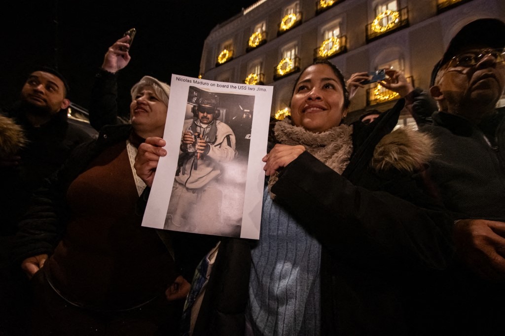 Venezuelan nationals residing in Madrid gather at Puerta del Sol to celebrate the U.S. military operation in Venezuela and the subsequent capture of President Nicolas Maduro.