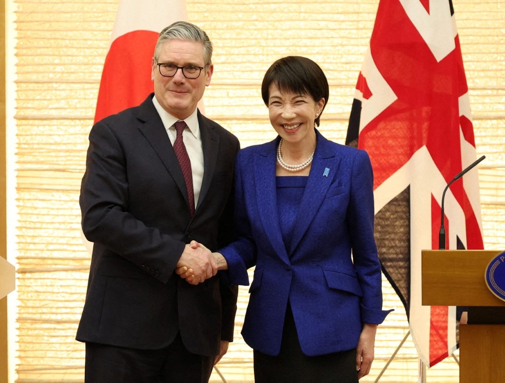 Britain's Prime Minister Keir Starmer (left) and Japanese Prime Minister Sanae Takaichi shake hands during a joint press conference after the summit meeting at the Prime Minister's office in Tokyo, Japan, on January 31, 2026.