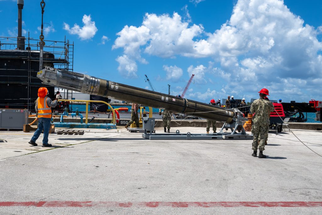 Sailors loading the Tomahawk missile onto the Los Angeles-class fast-attack submarine USS Jefferson City