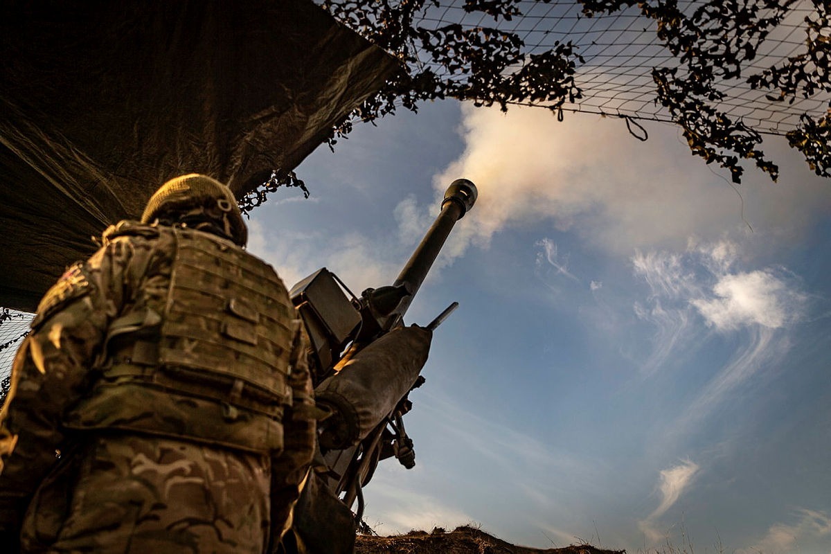 A soldier from the Royal Scots Dragoon Guards operating an anti-aircraft gun during Exercise Steadfast Defender, demonstrating mobile air defense capabilities.